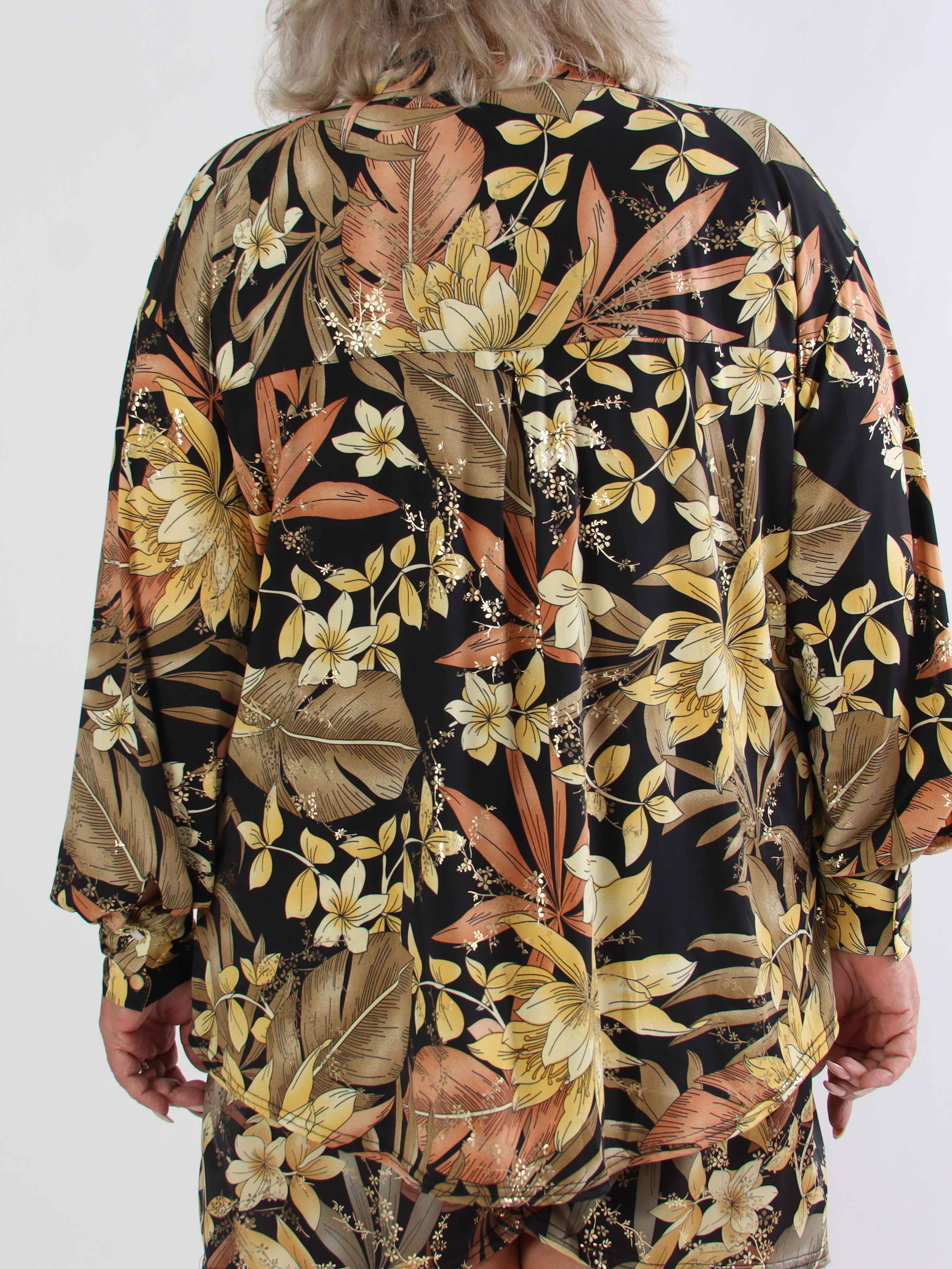 Pamy - Plus size skjorta i stretchigt blommigt tyg