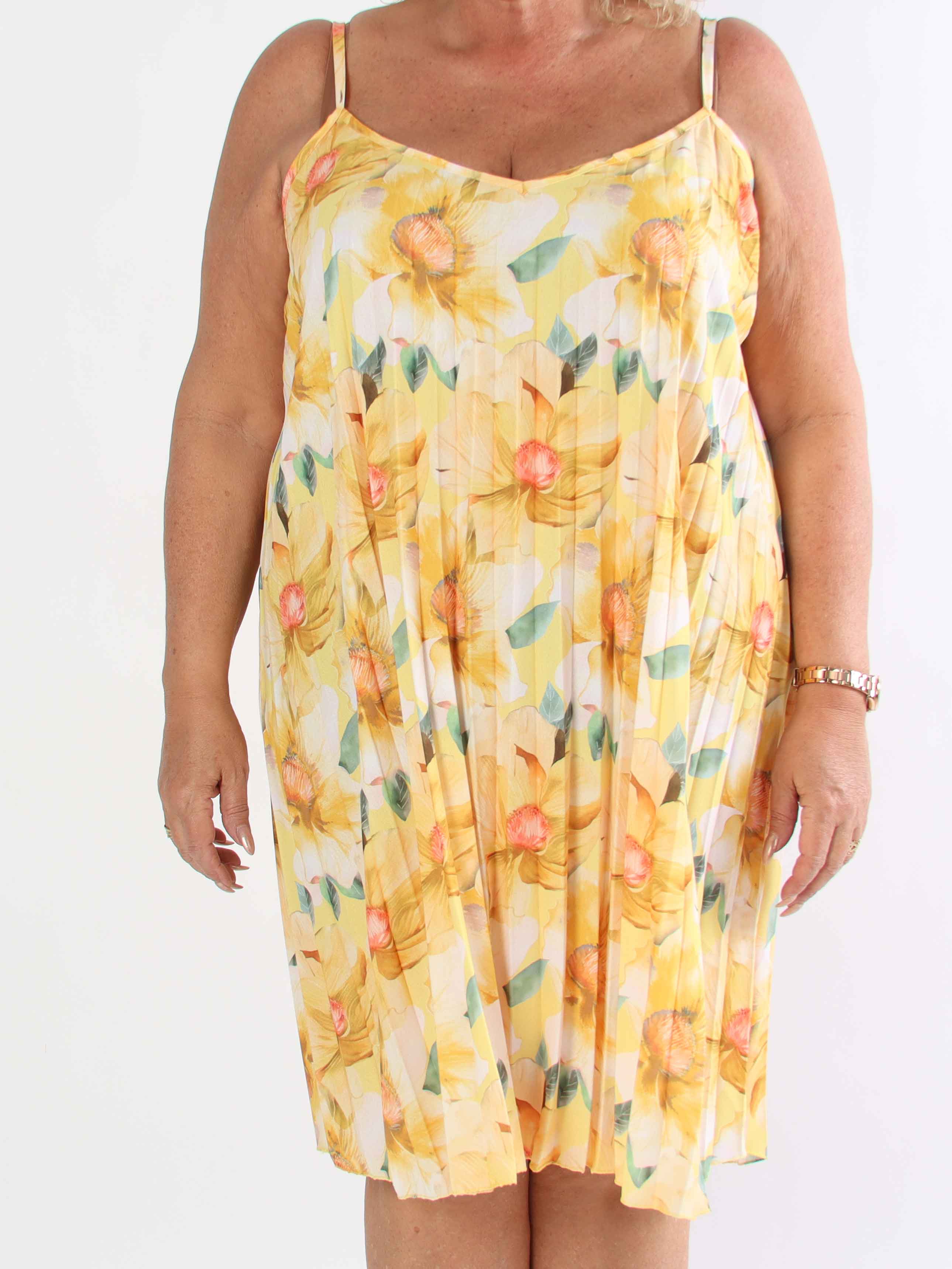 Poppy - Söt plisserad klänning i viskos med blomstermönster