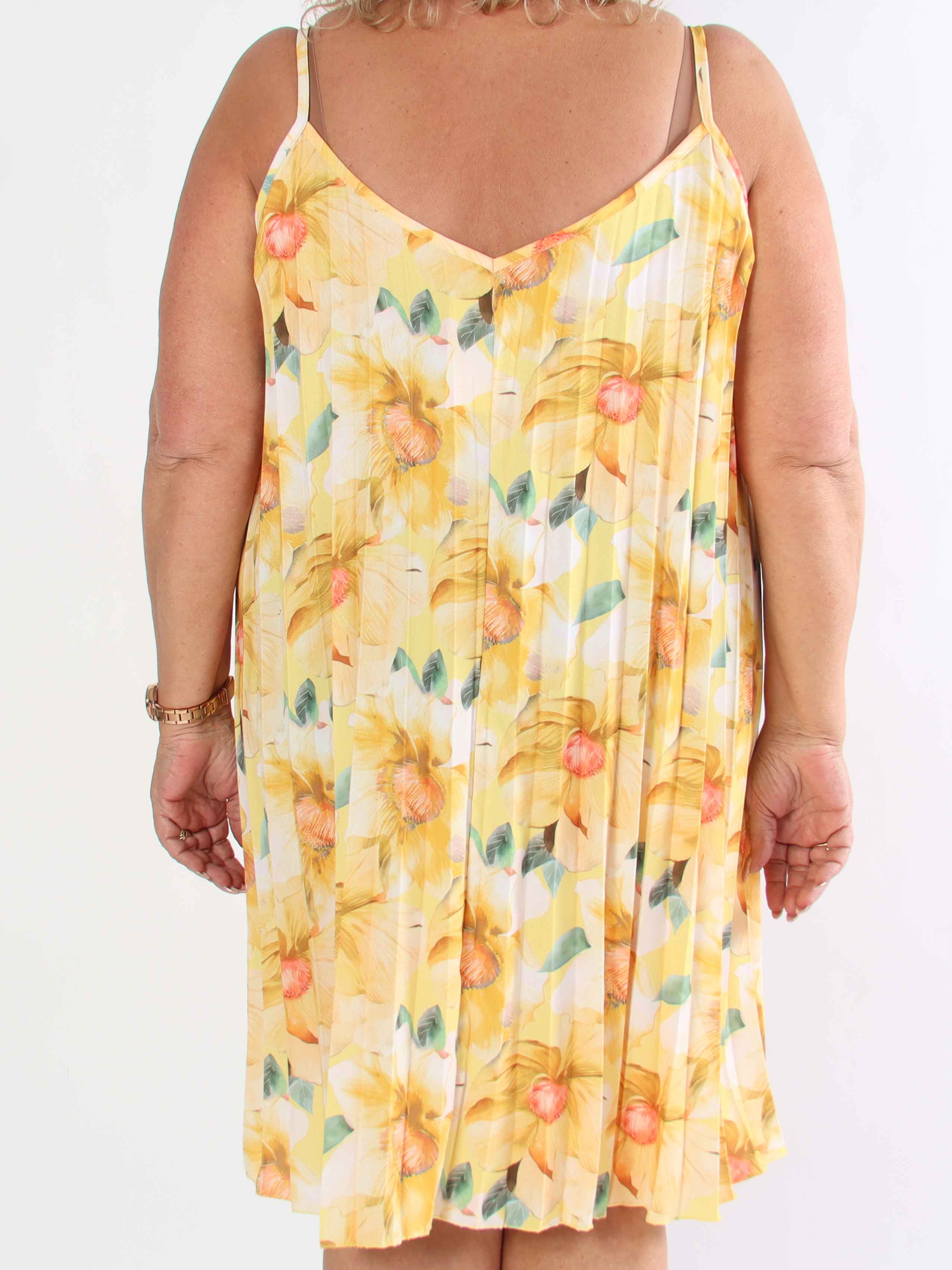 Poppy - Söt plisserad klänning i viskos med blomstermönster