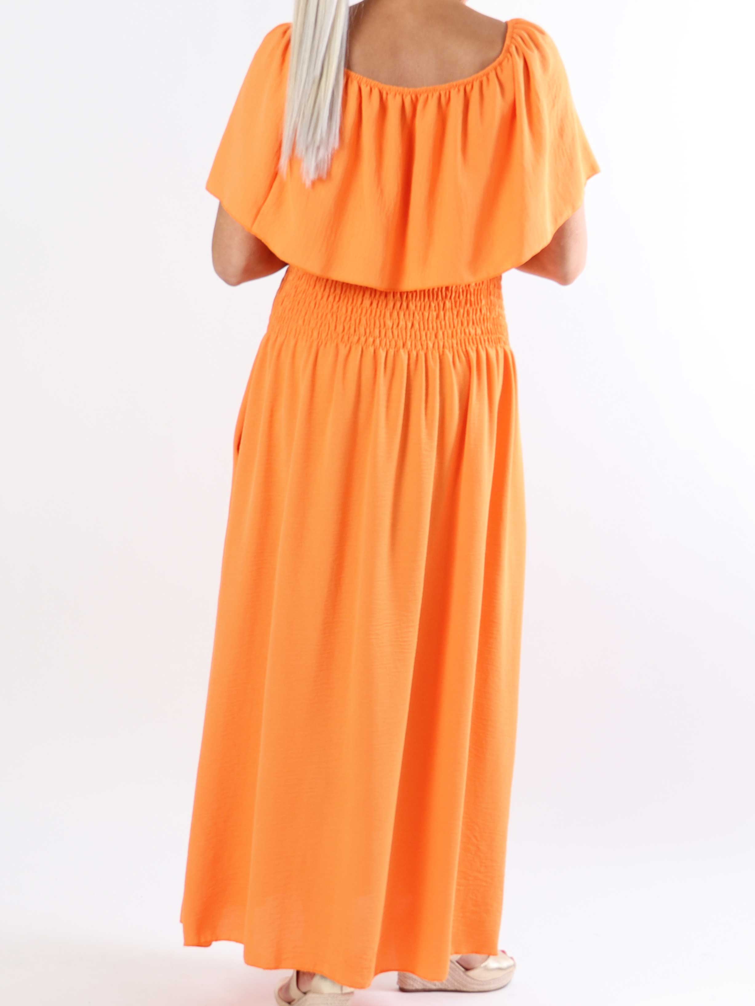 Rachel - Lång plus size-klänning med fickor och volang i nederkanten