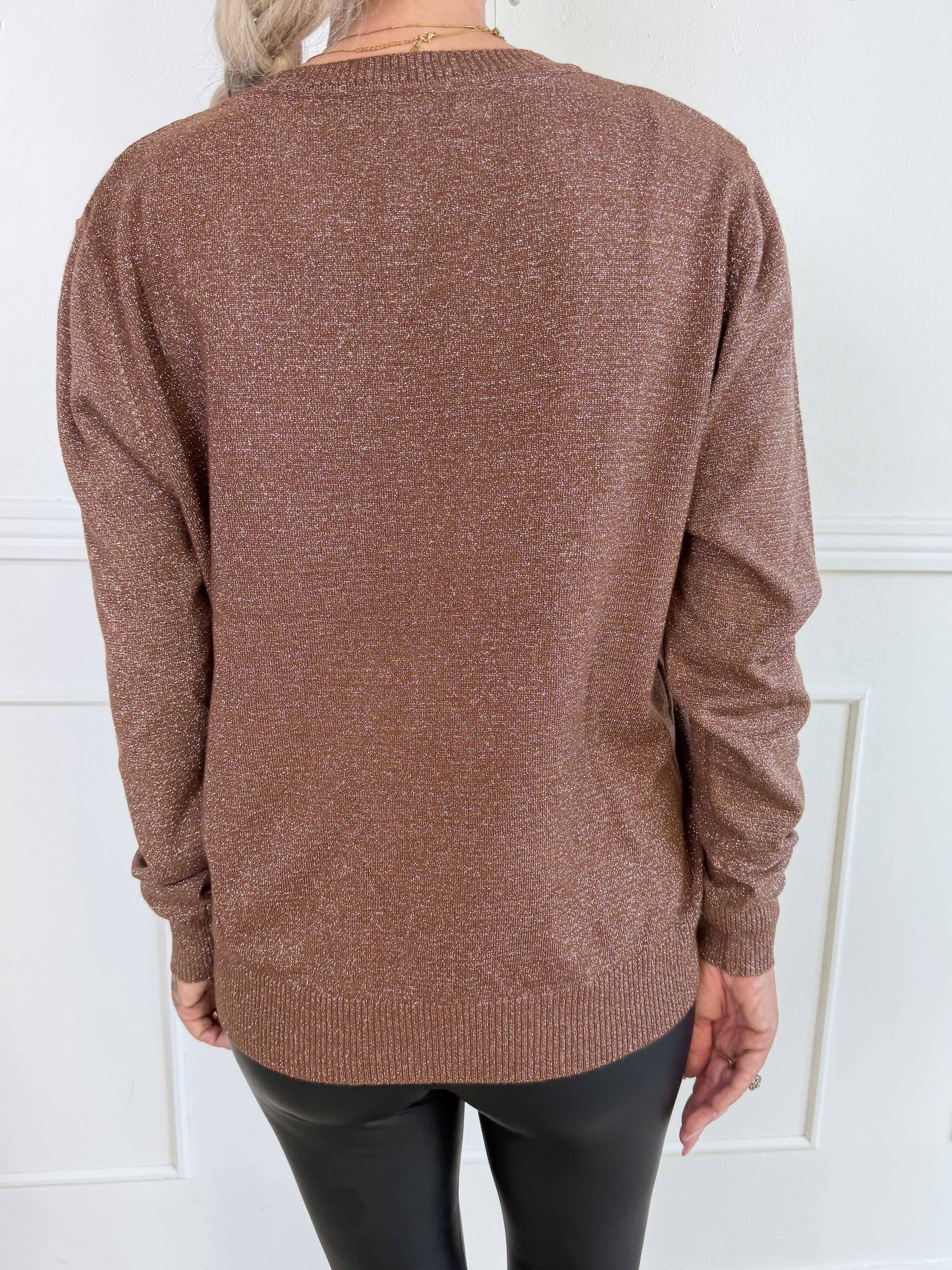 Ronja - Feminin strikbluse med fine glittertråde og en elegant V-udskæring
