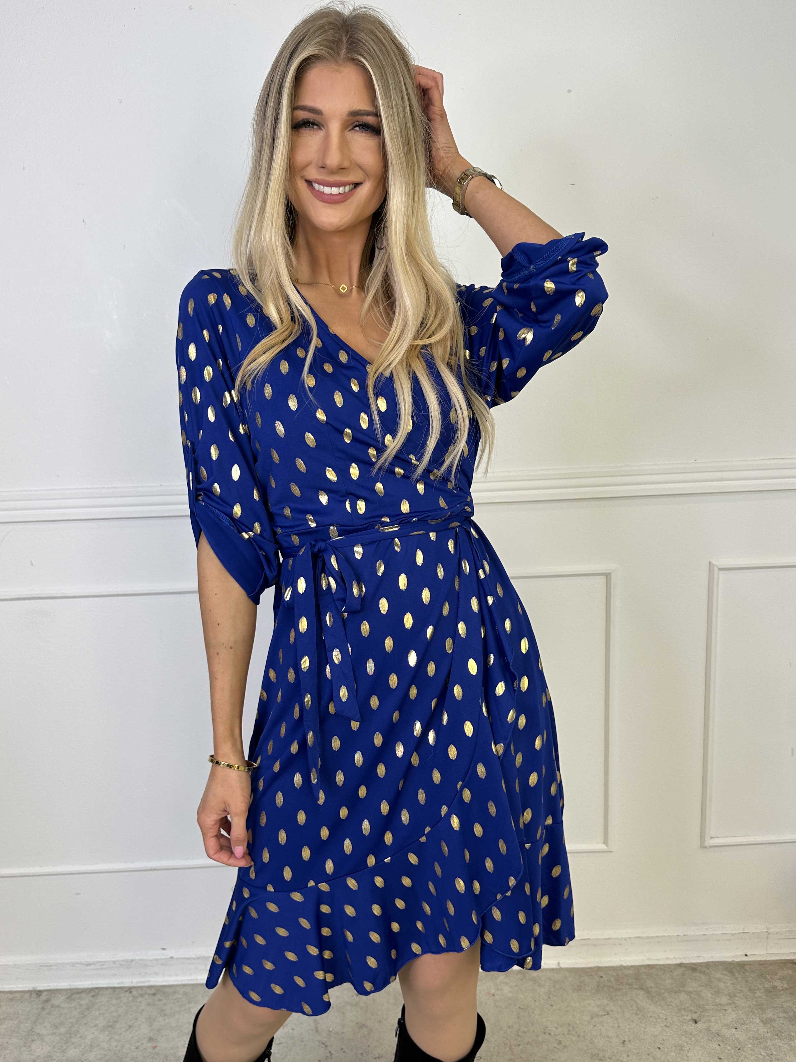 Savina Gold - Elastisk kjole i slå-om-look med guld dutter