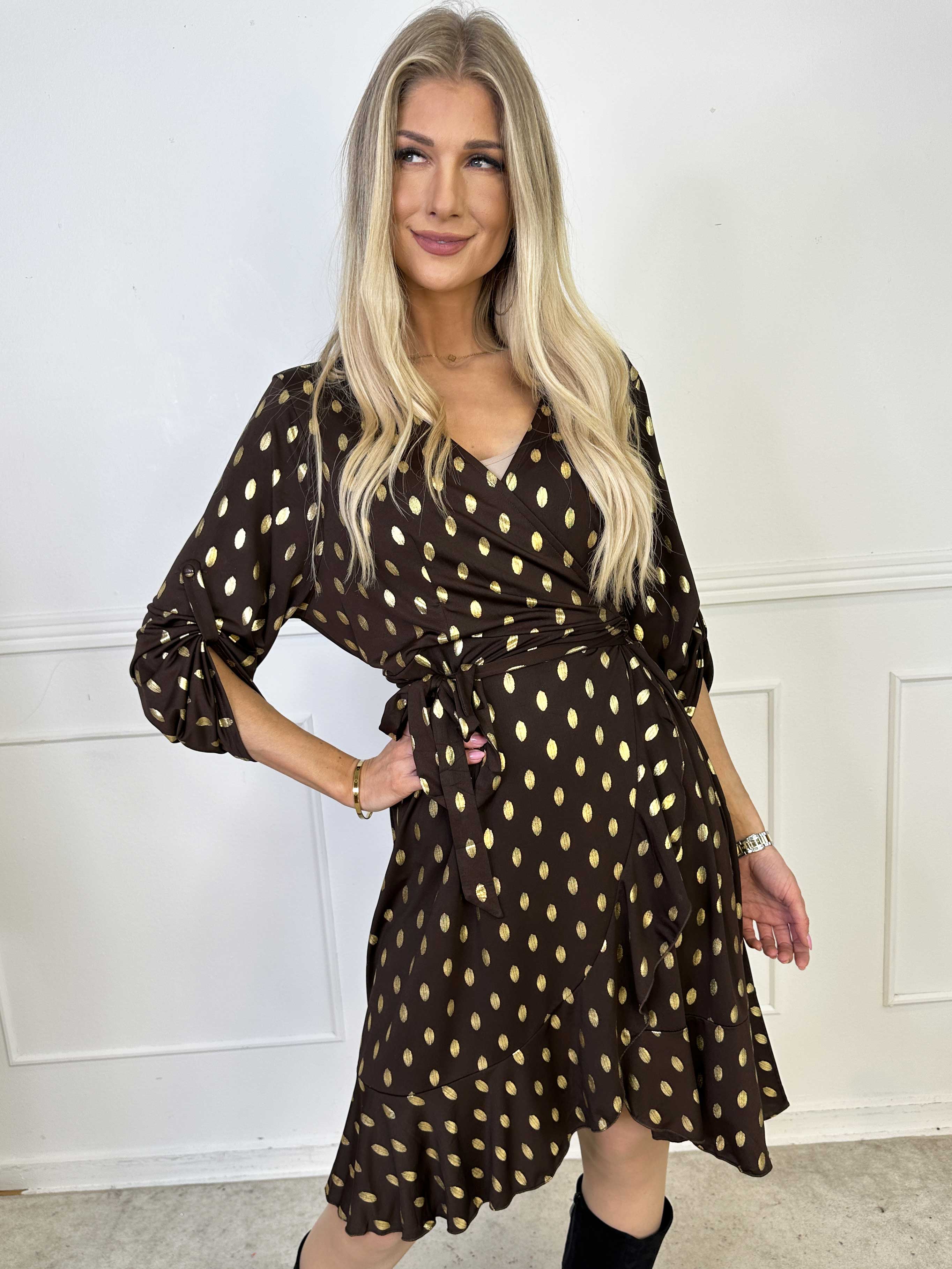 Savina Gold - Elastisk kjole i slå-om-look med guld dutter