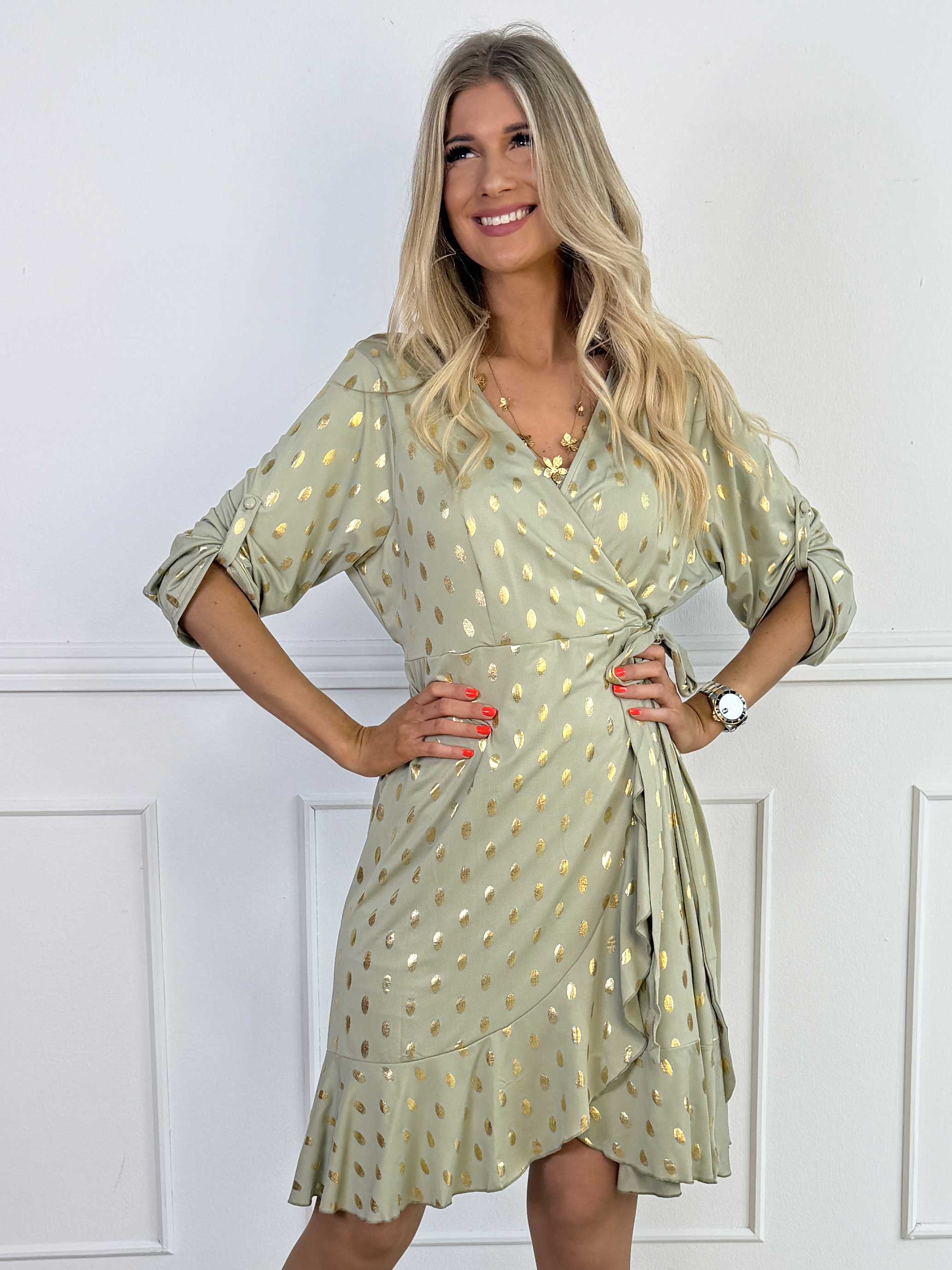 Savina Gold - Elastisk klänning i omlott-look med guldprickar