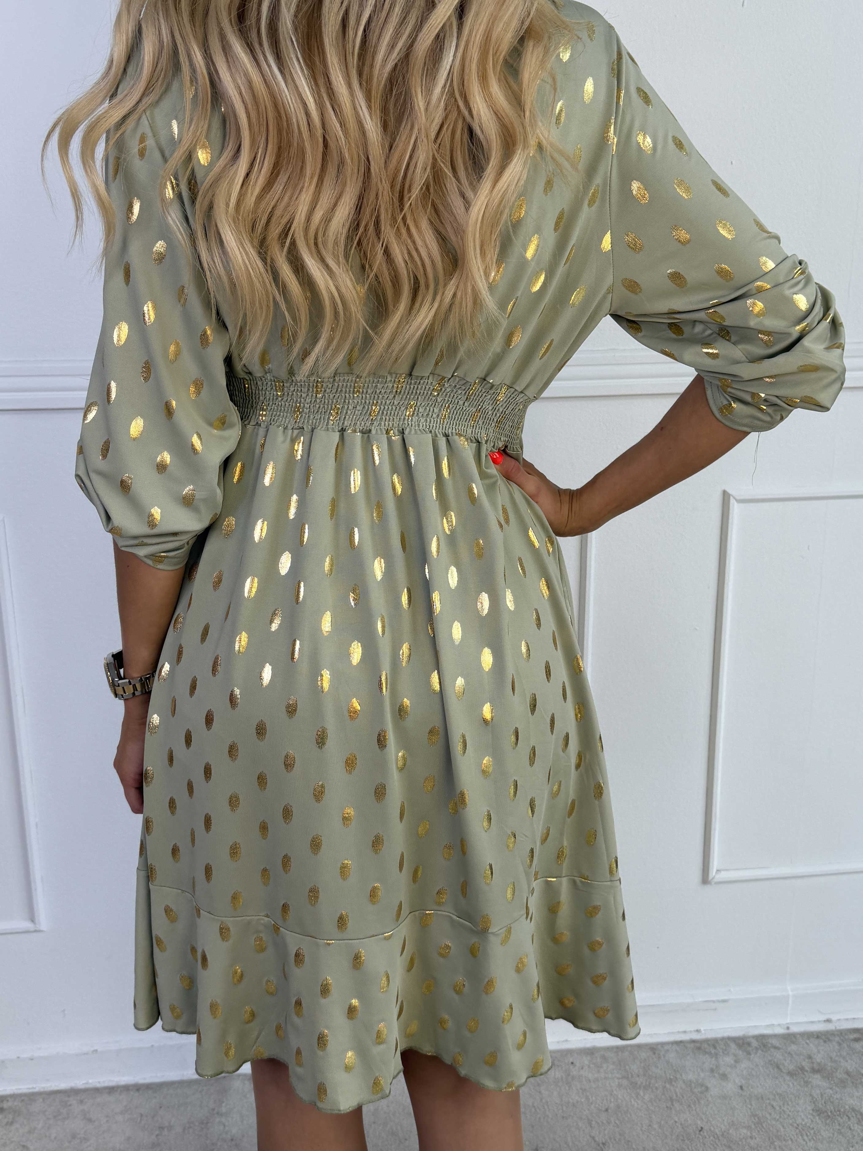 Savina Gold - Elastisk klänning i omlott-look med guldprickar