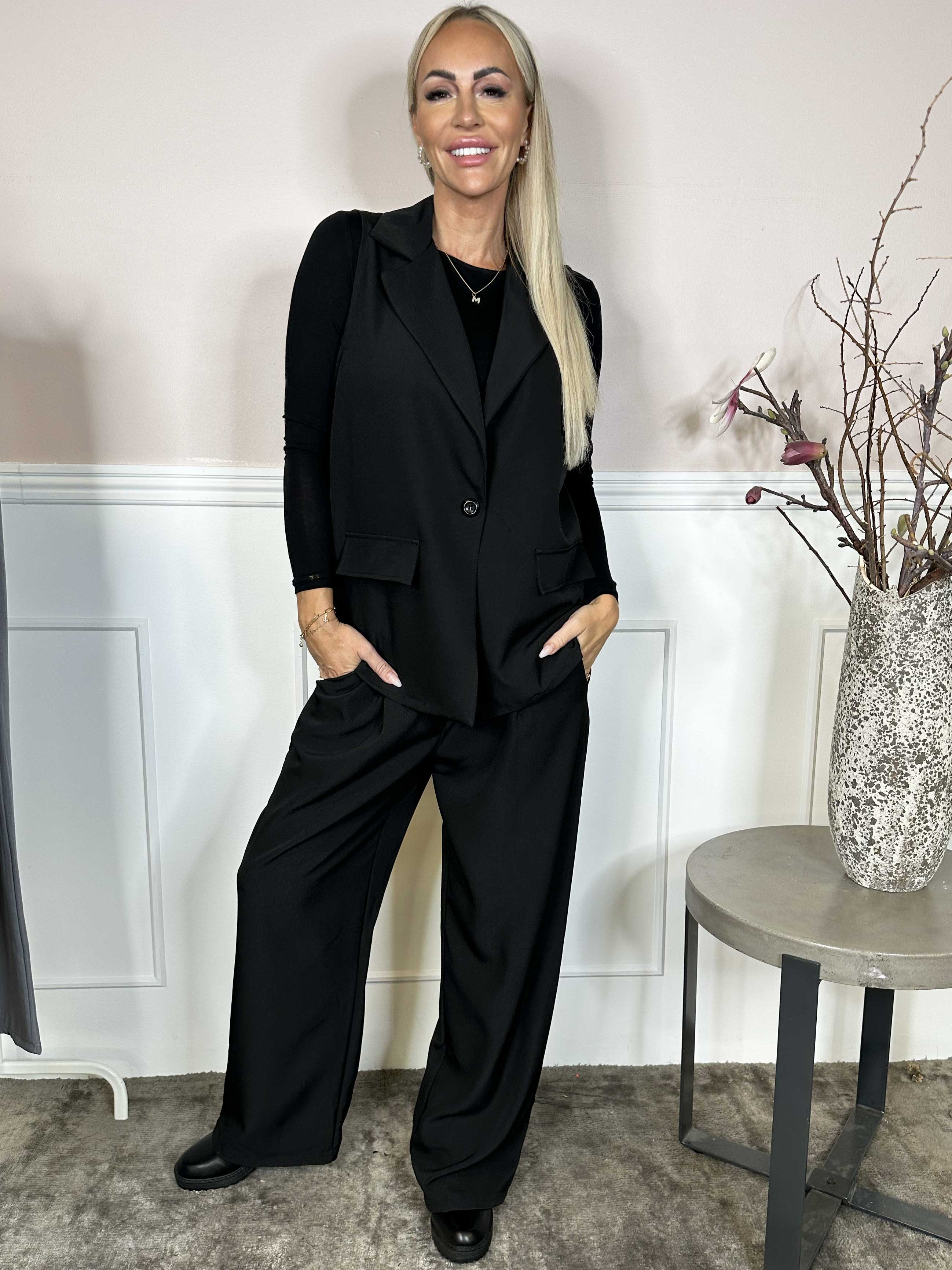 Shadia Pants - Enfärgade kostymbyxor med resår i ryggen