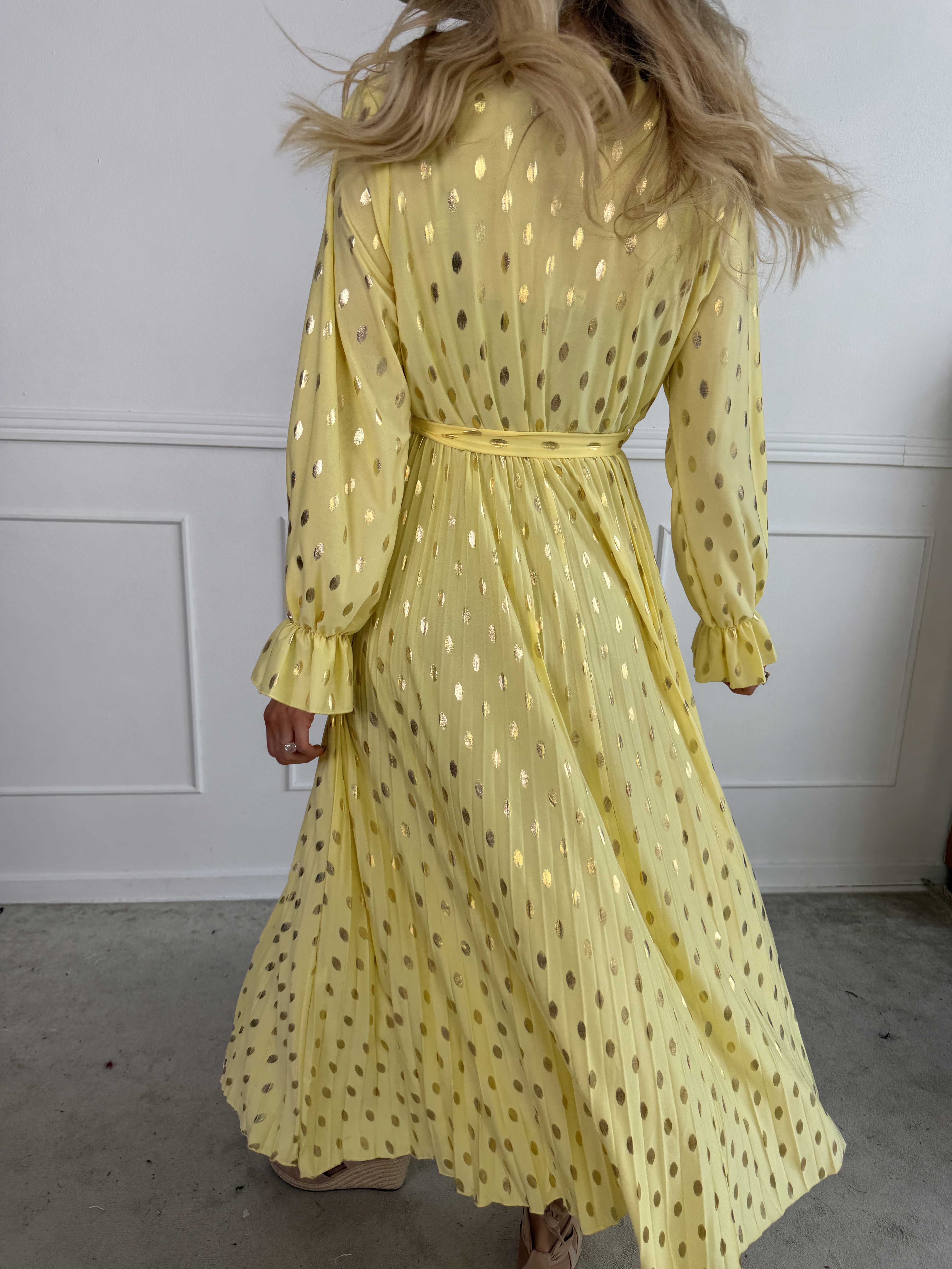 Silvija Dot - Lang elastisk kjole med guld dutter og plisseret skørt