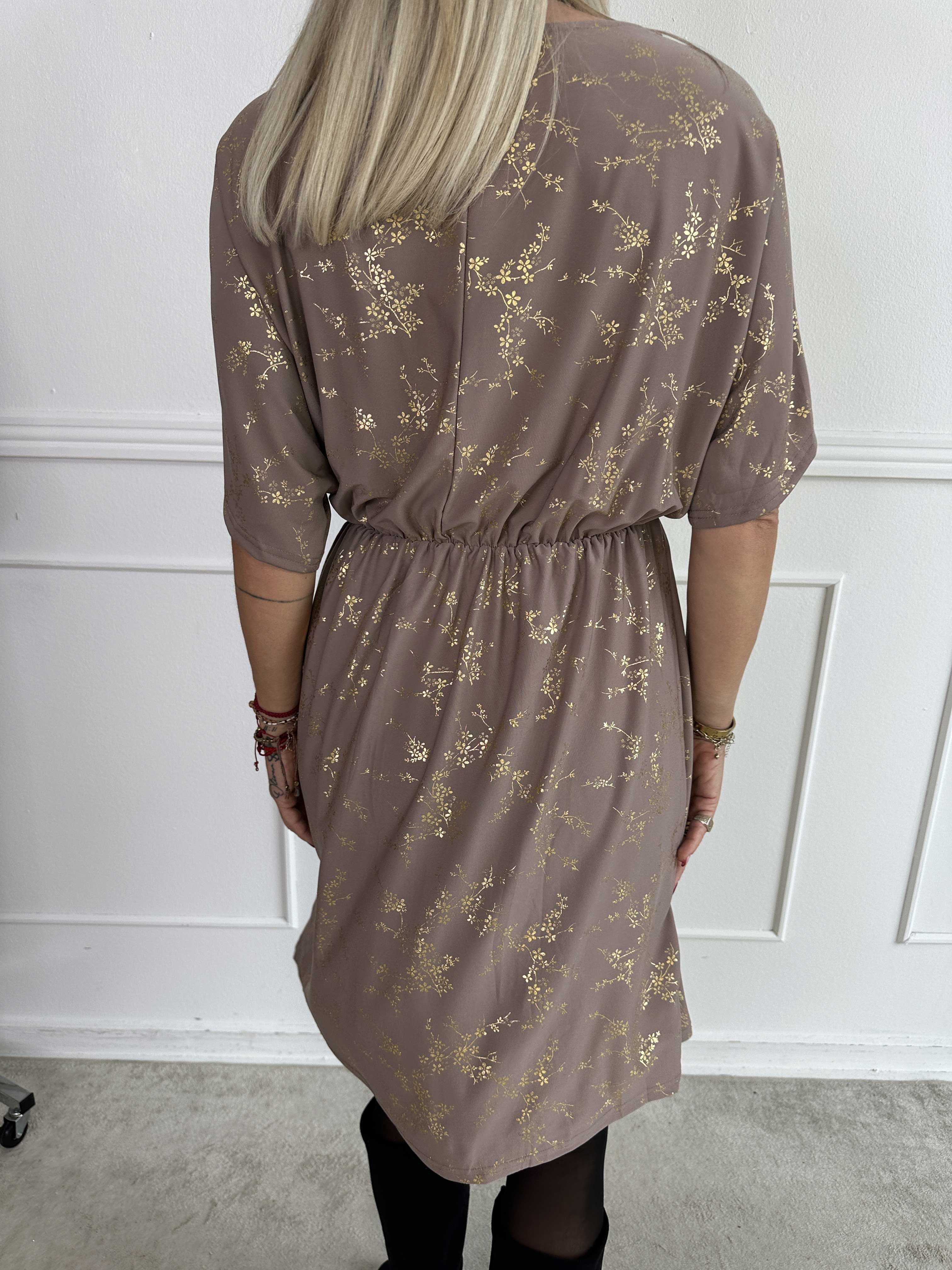 Venus Gold - Elastisk klänning mönstrad med guldfärgade blommor