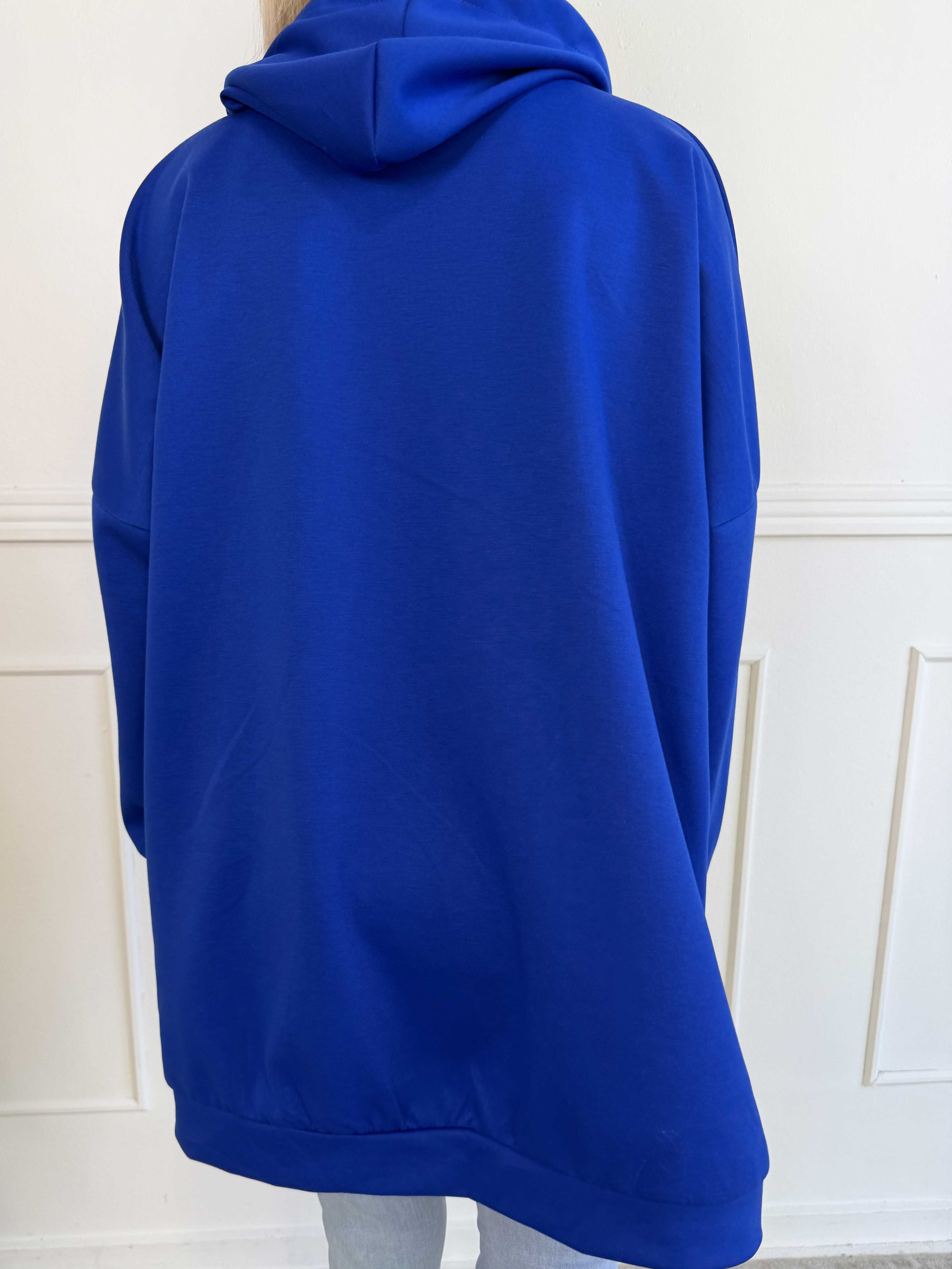 Victoria - Oversized hoodie med et pink mærke på ærmet