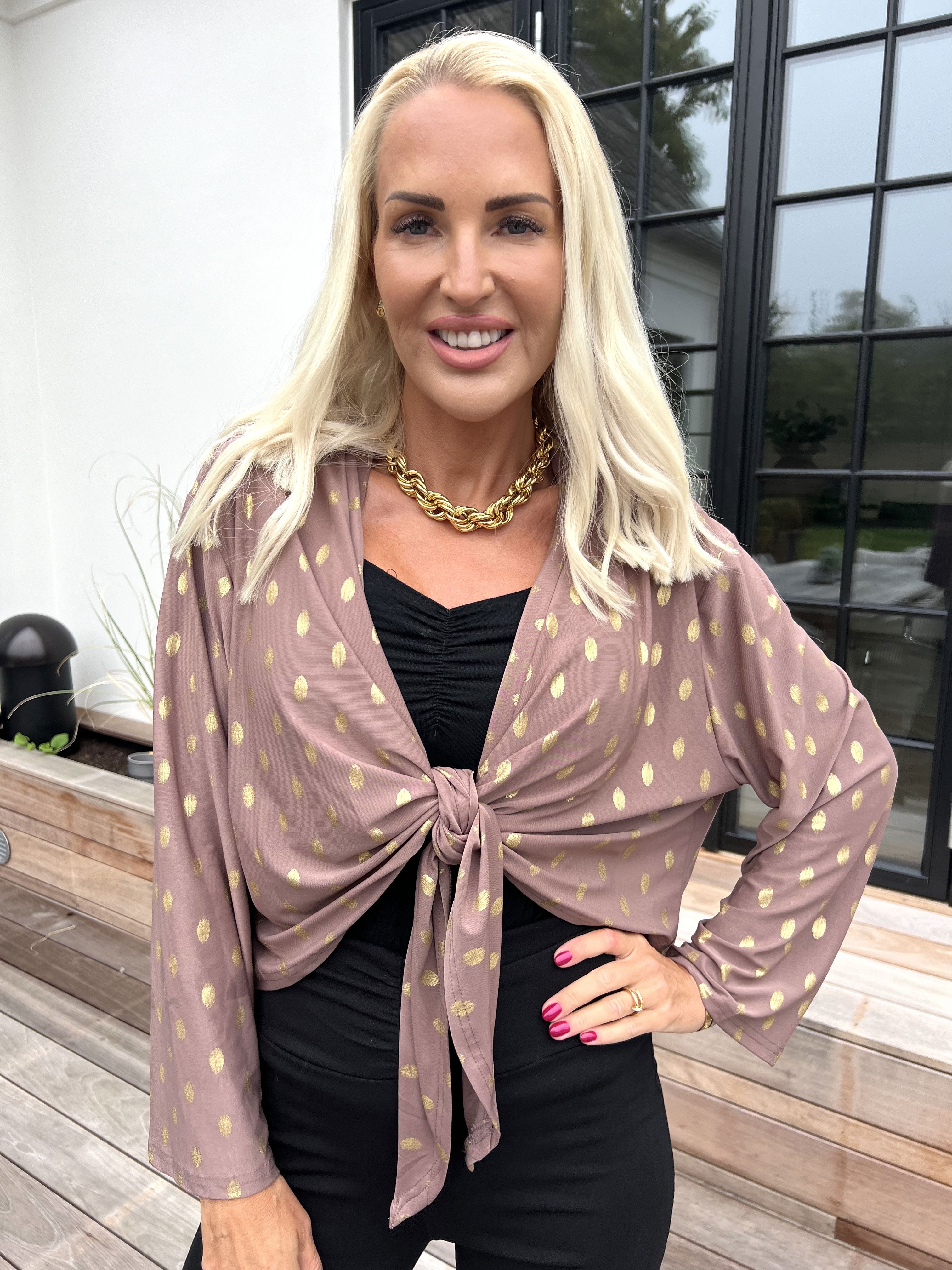 Werena Dot - Kort elastisk kofta med guldfärgade prickar