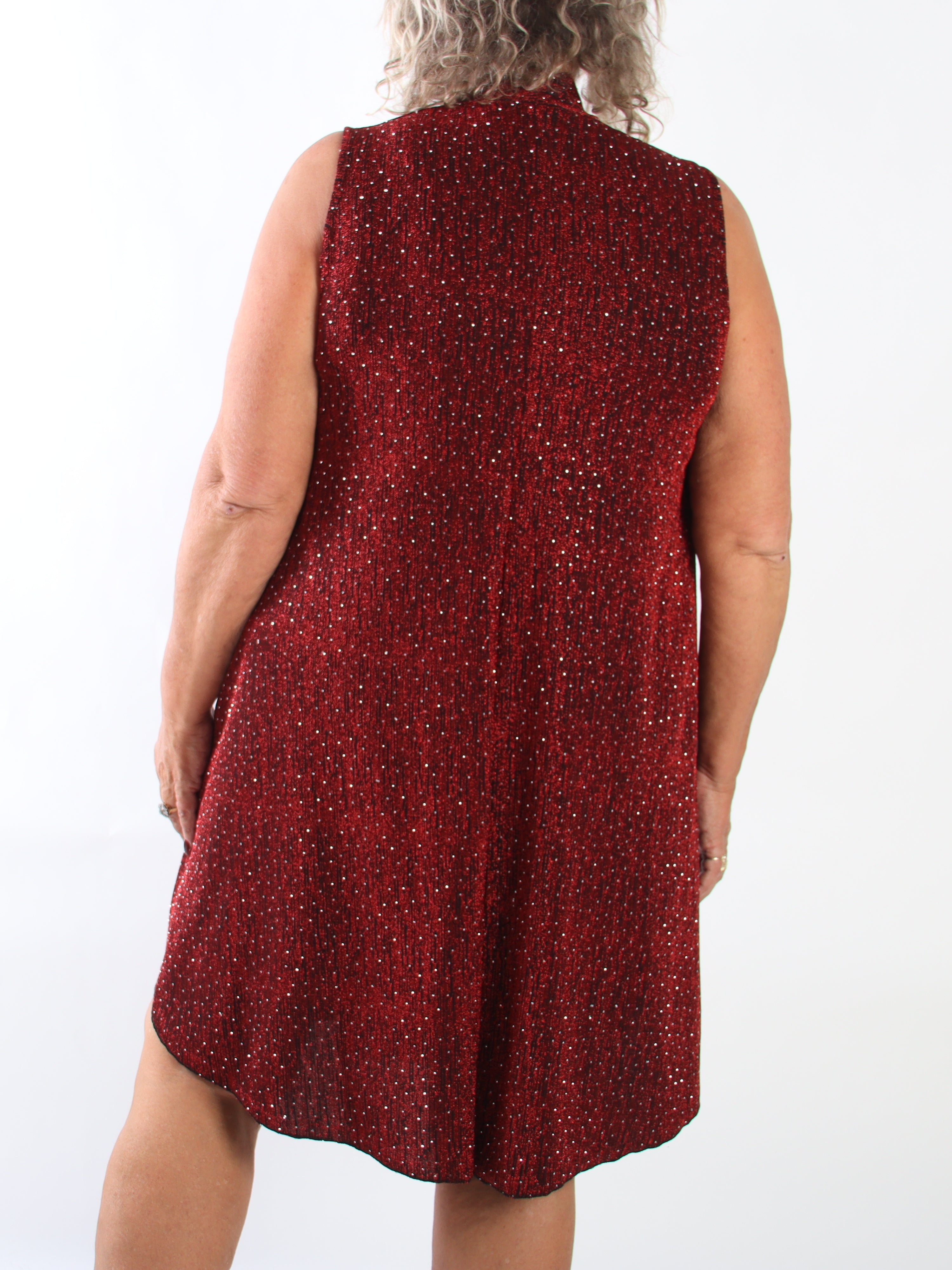 Bibbiana - Stretchig klänning i plus size med glittrande glittertrådar och fina strass