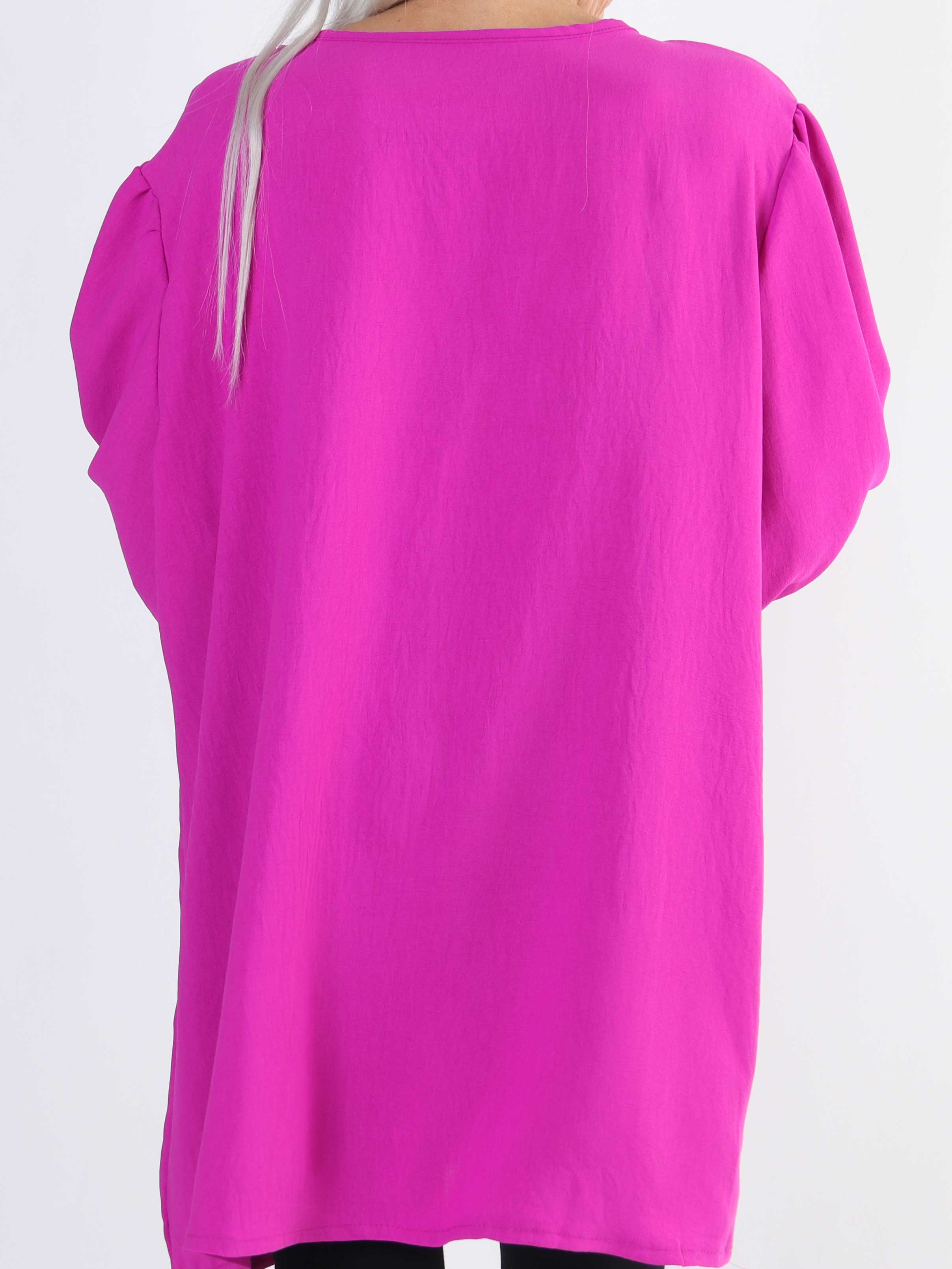 Cassandra - Söt tunika i stor storlek med rosett på bröstet