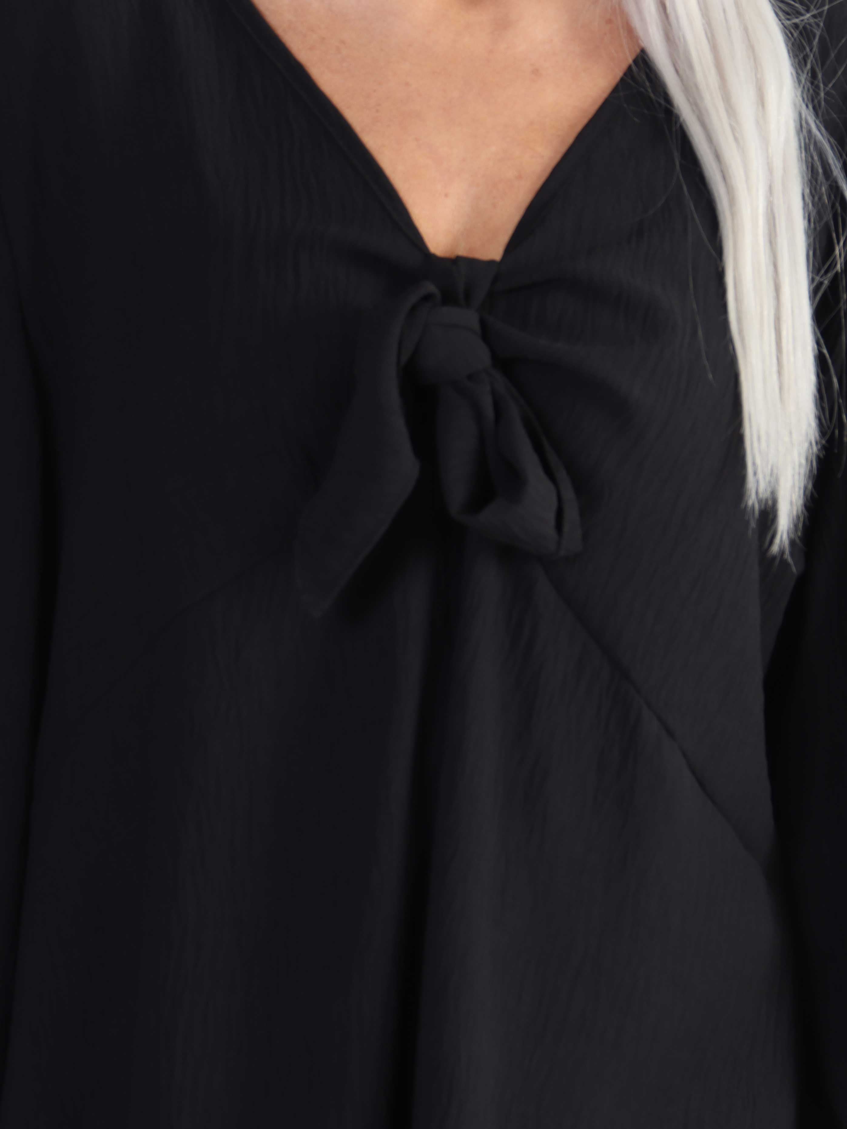 Cassandra - Söt tunika i stor storlek med rosett på bröstet