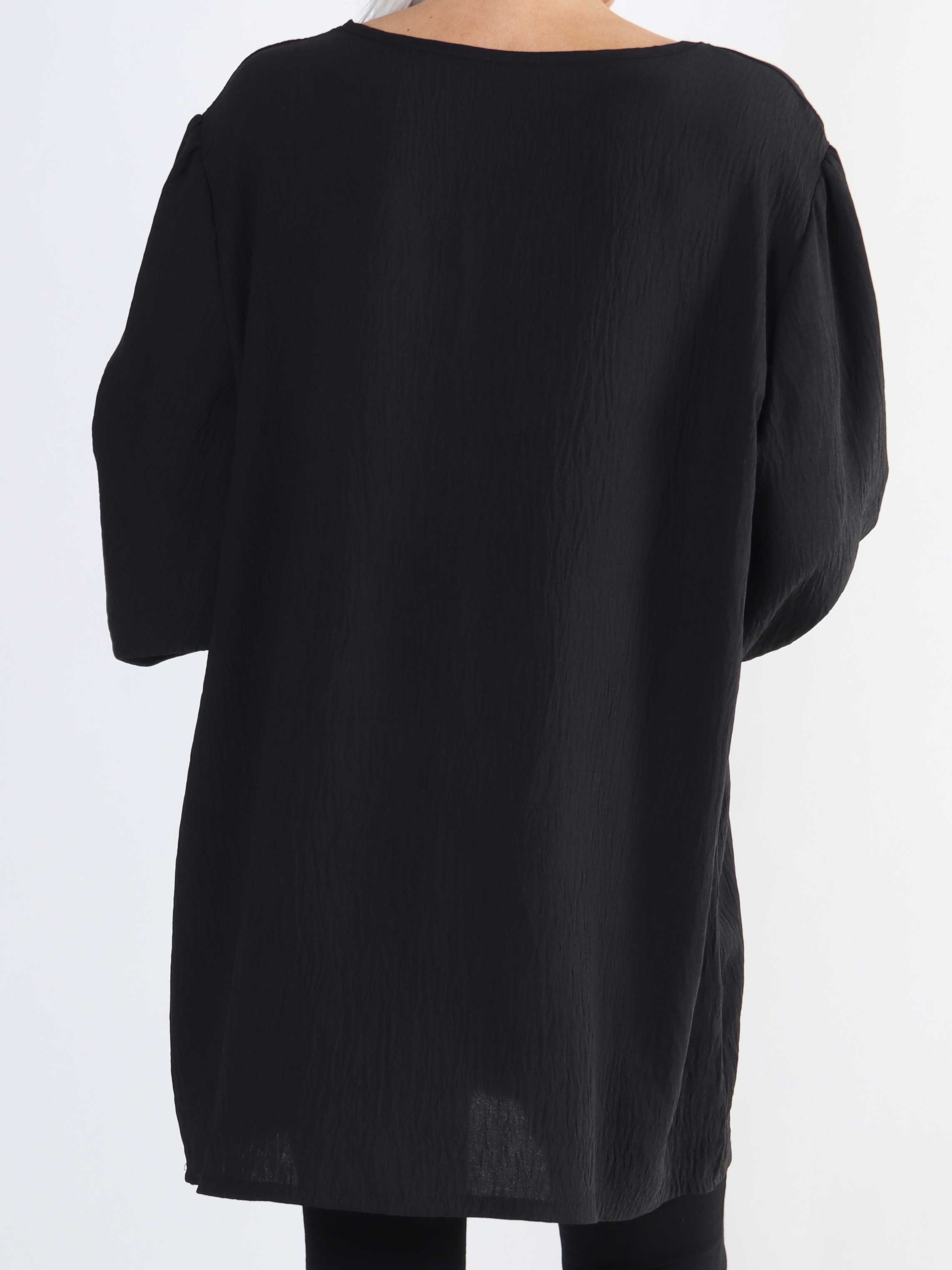 Cassandra - Söt tunika i stor storlek med rosett på bröstet