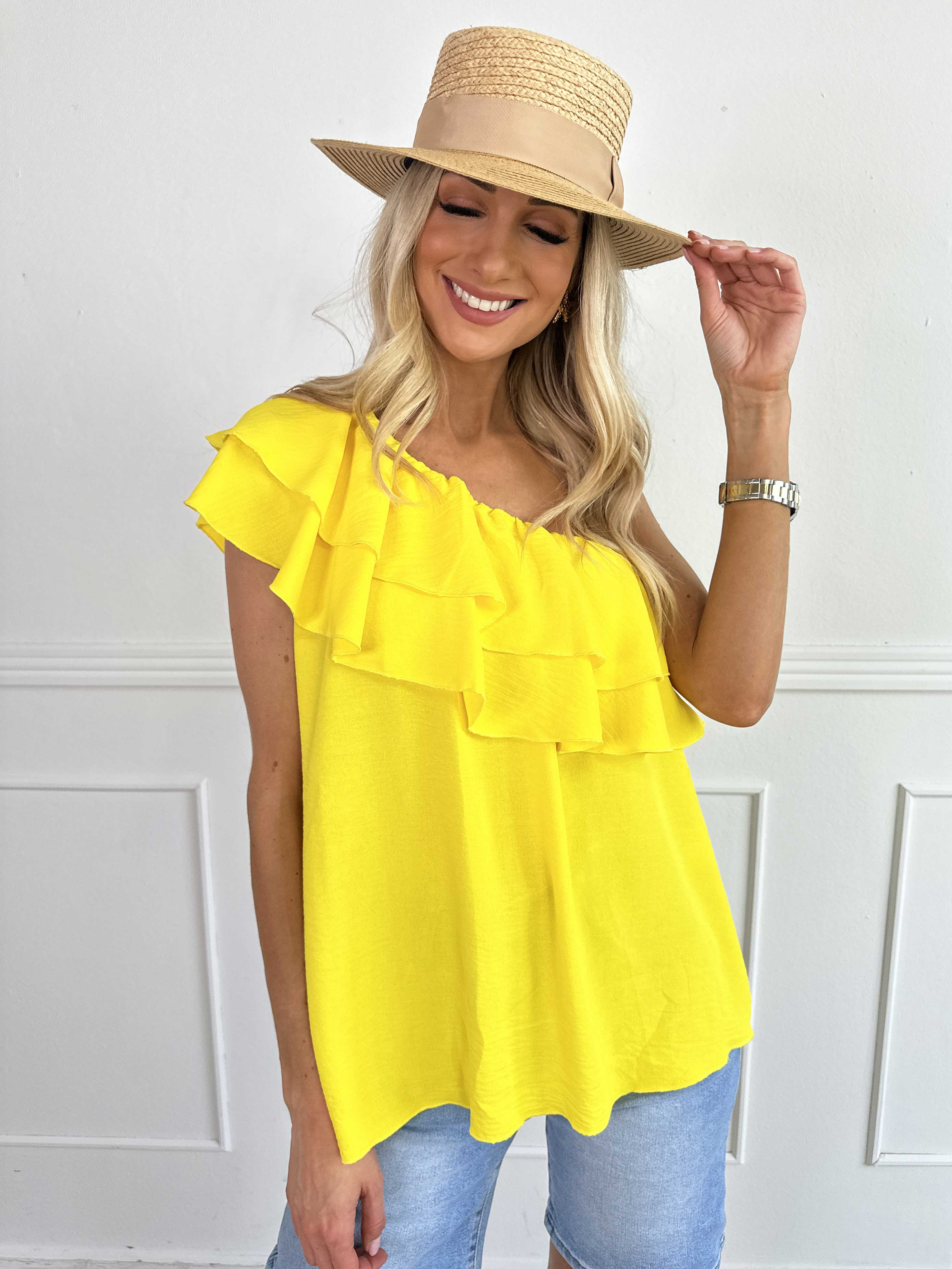 Catelyn Top - Söt one shoulder topp med volanger