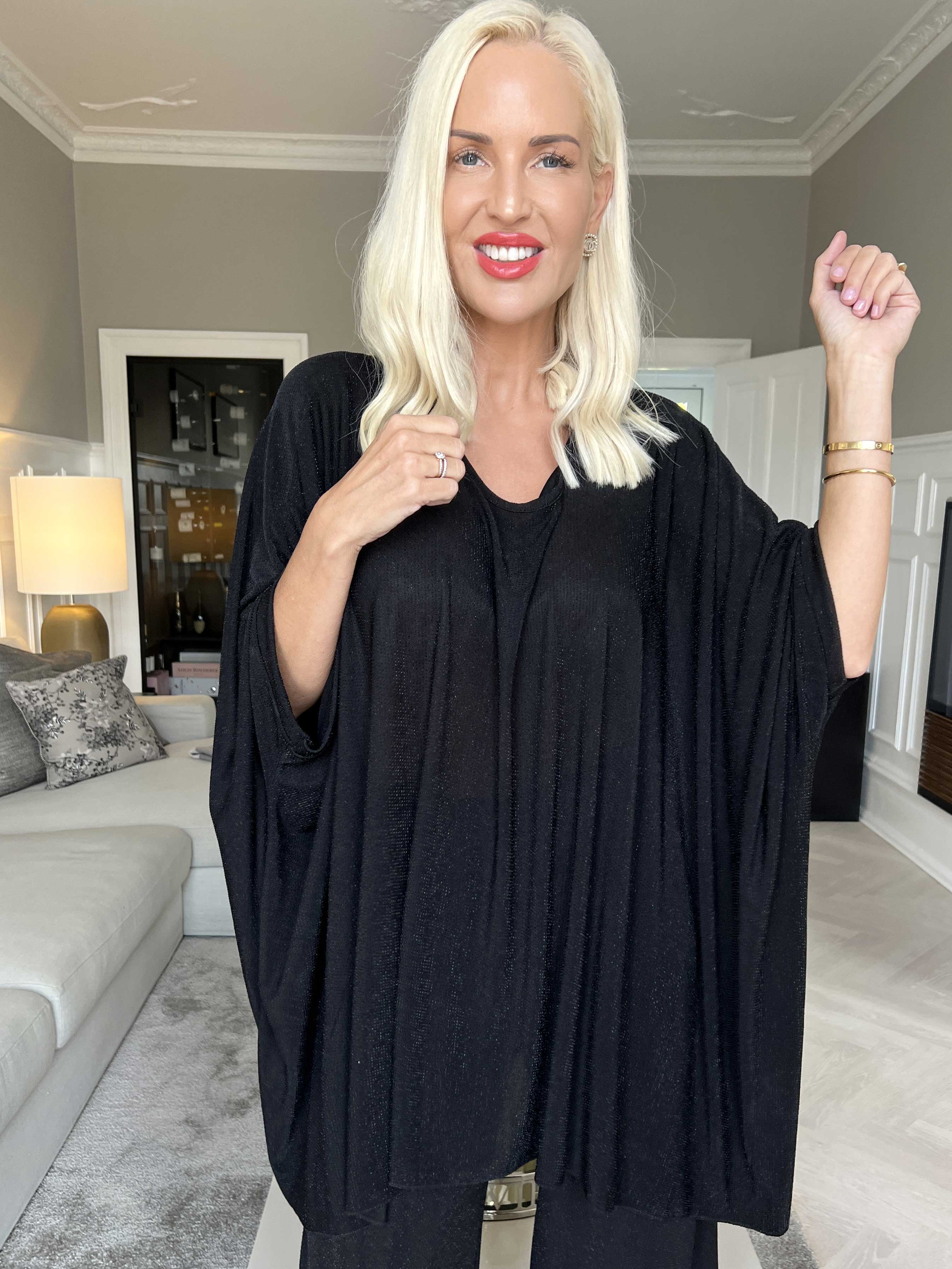 Estella Glitter - Oversized tunika med fladdermusärmar