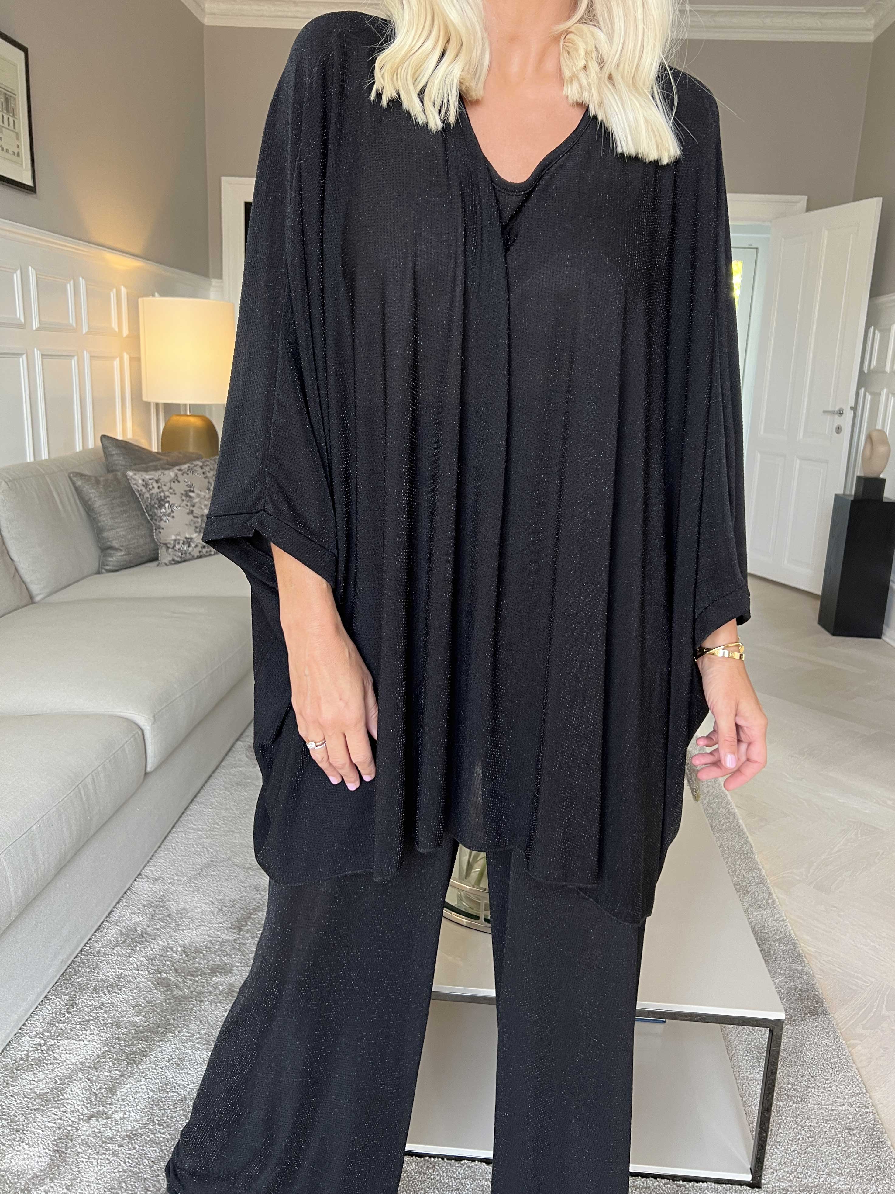 Estella Glitter - Oversized tunika med fladdermusärmar