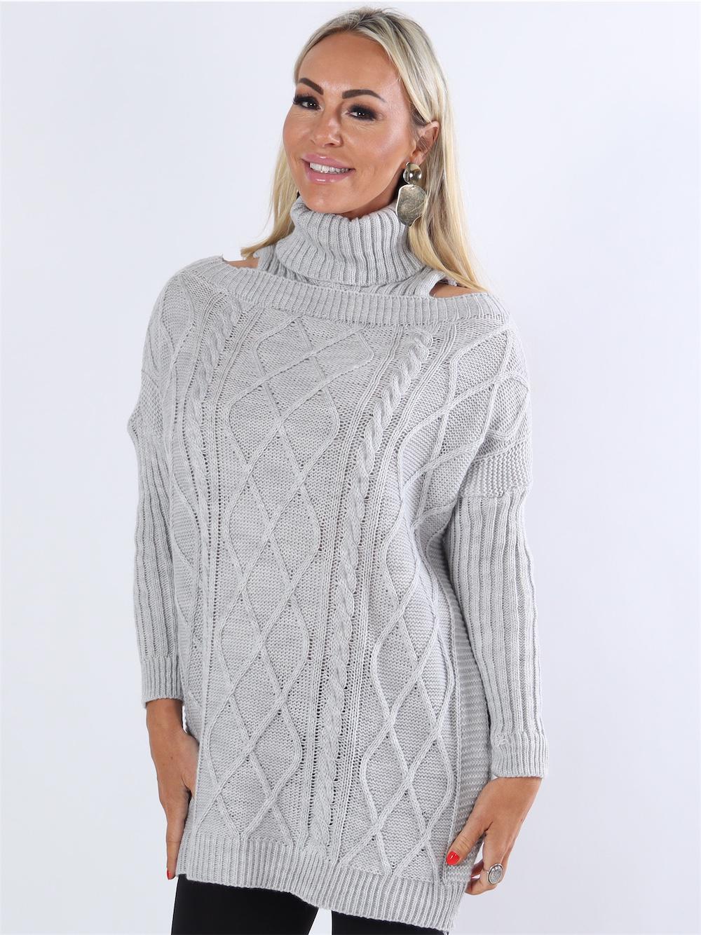 Abira - Beigefärgad stickning med rullkrage och öppna axlar