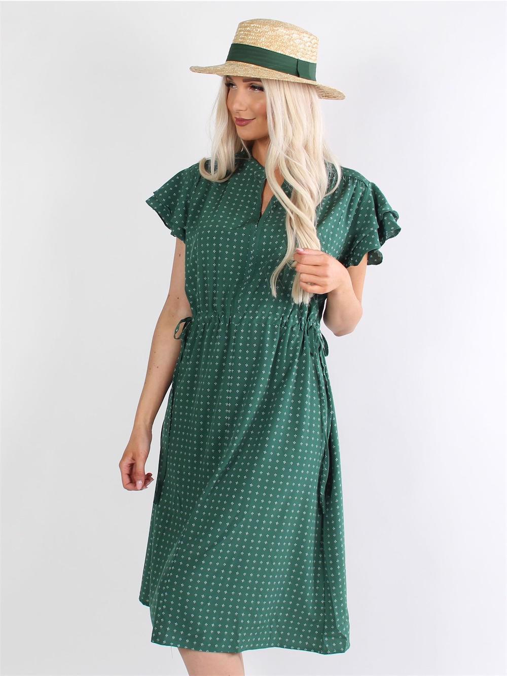 Adelita - Klänning med vitt mönster, volangärmar och band i midjan