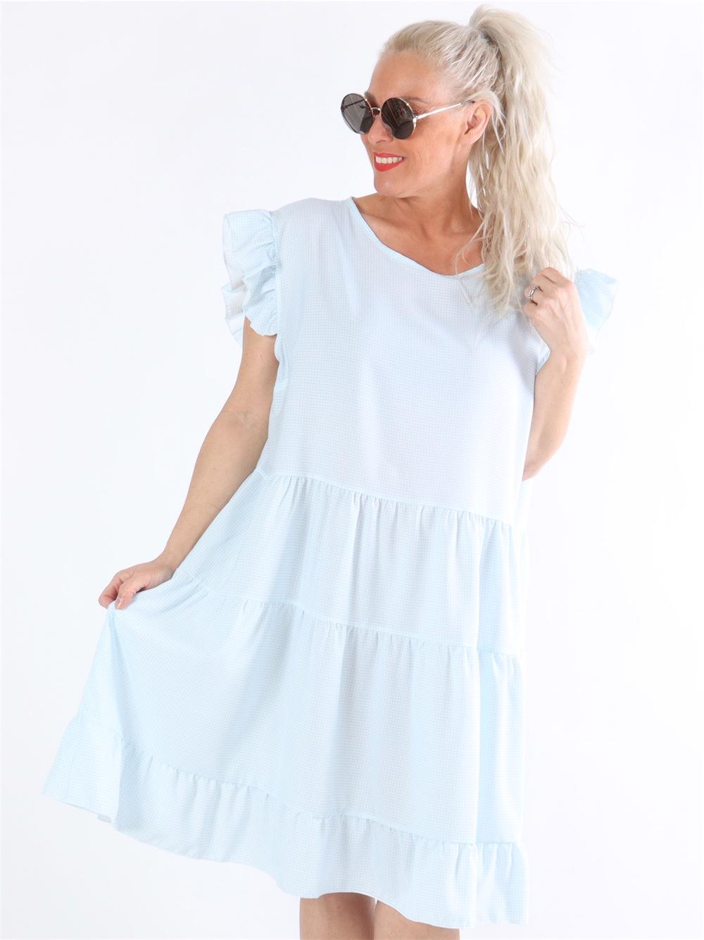 Adora - Beige och vit rutig klänning med volanger