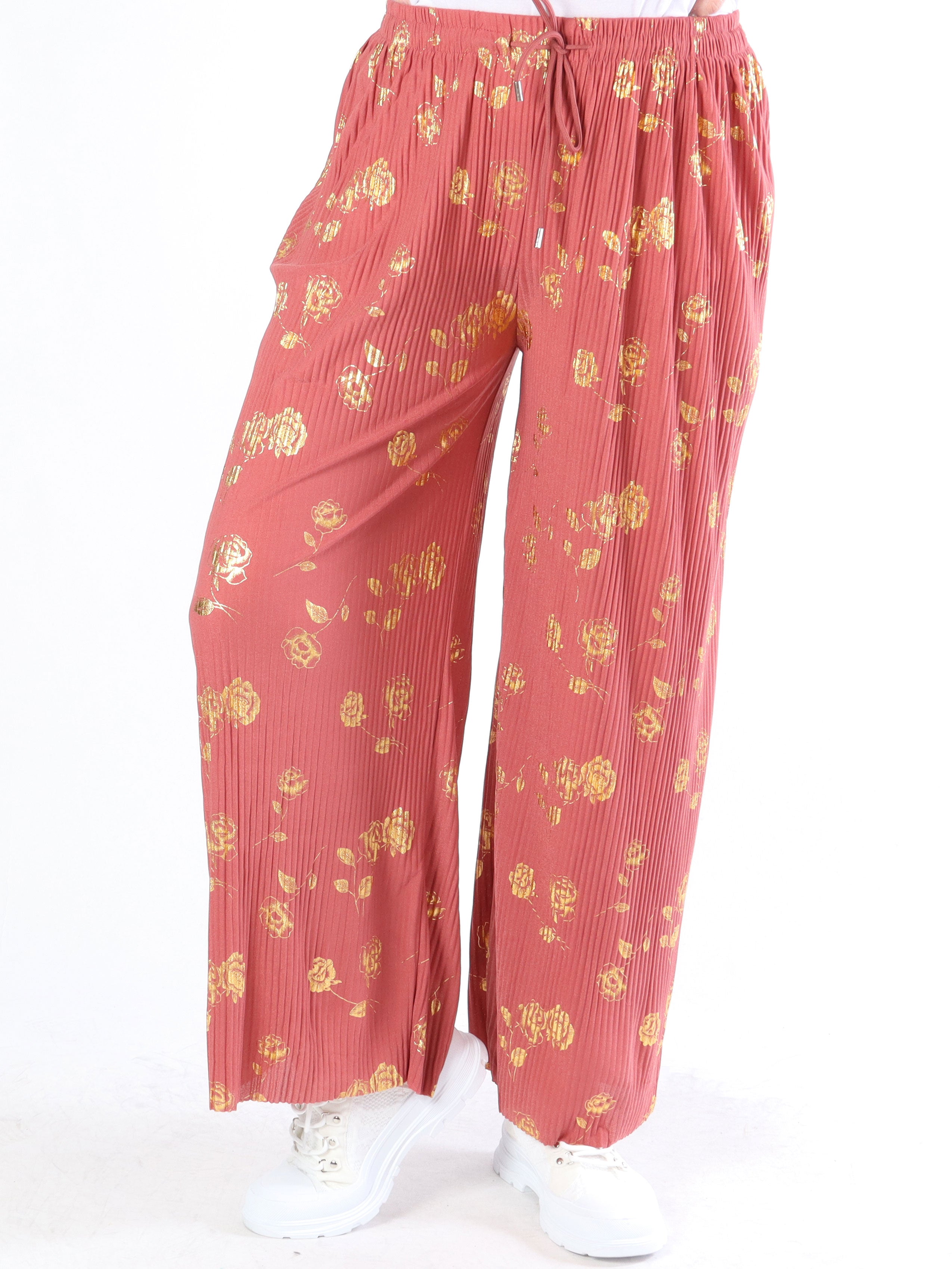 Alpha - Plisserade byxor med guldblommor