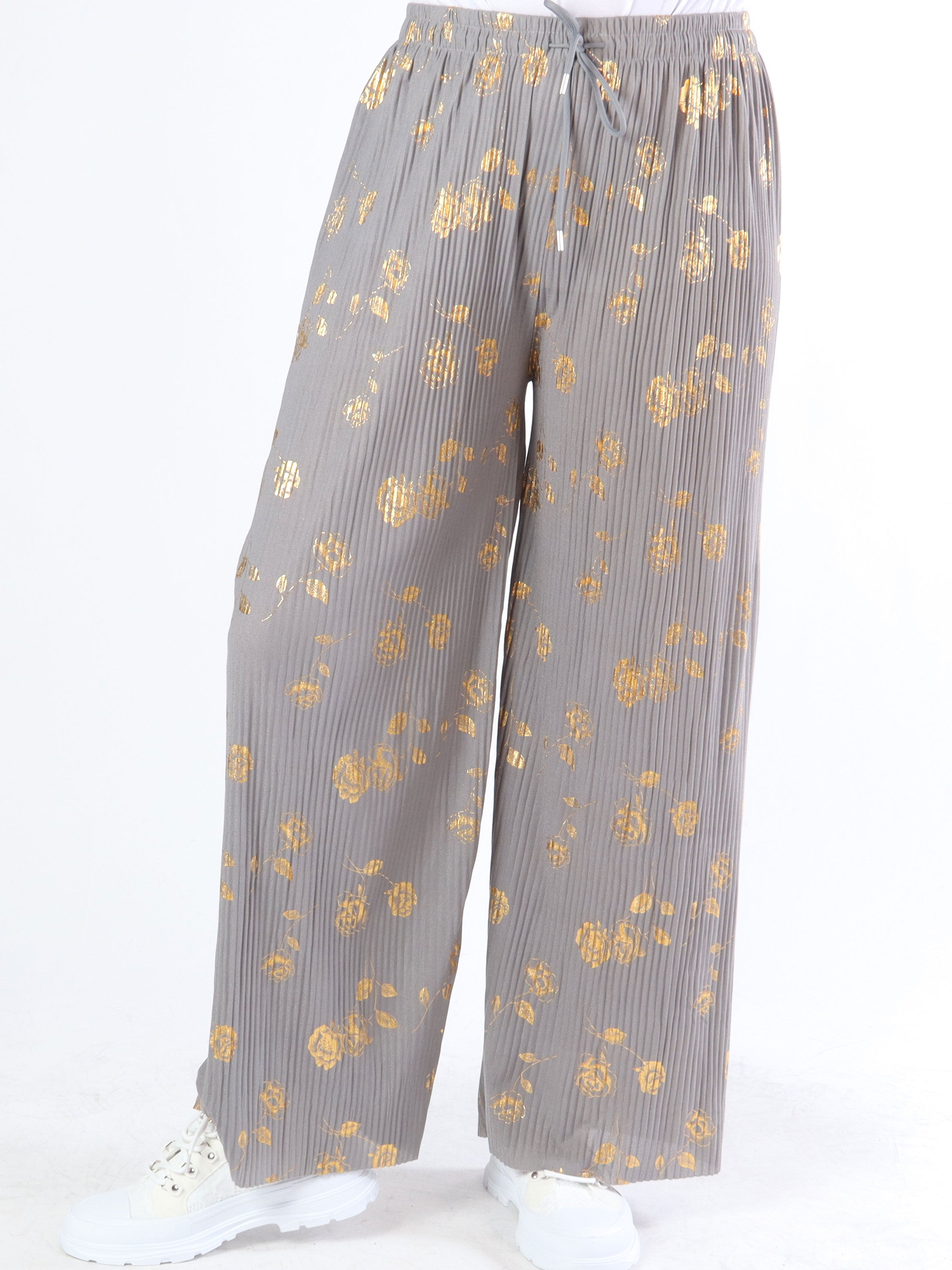 Alpha - Plisserade byxor med guldblommor
