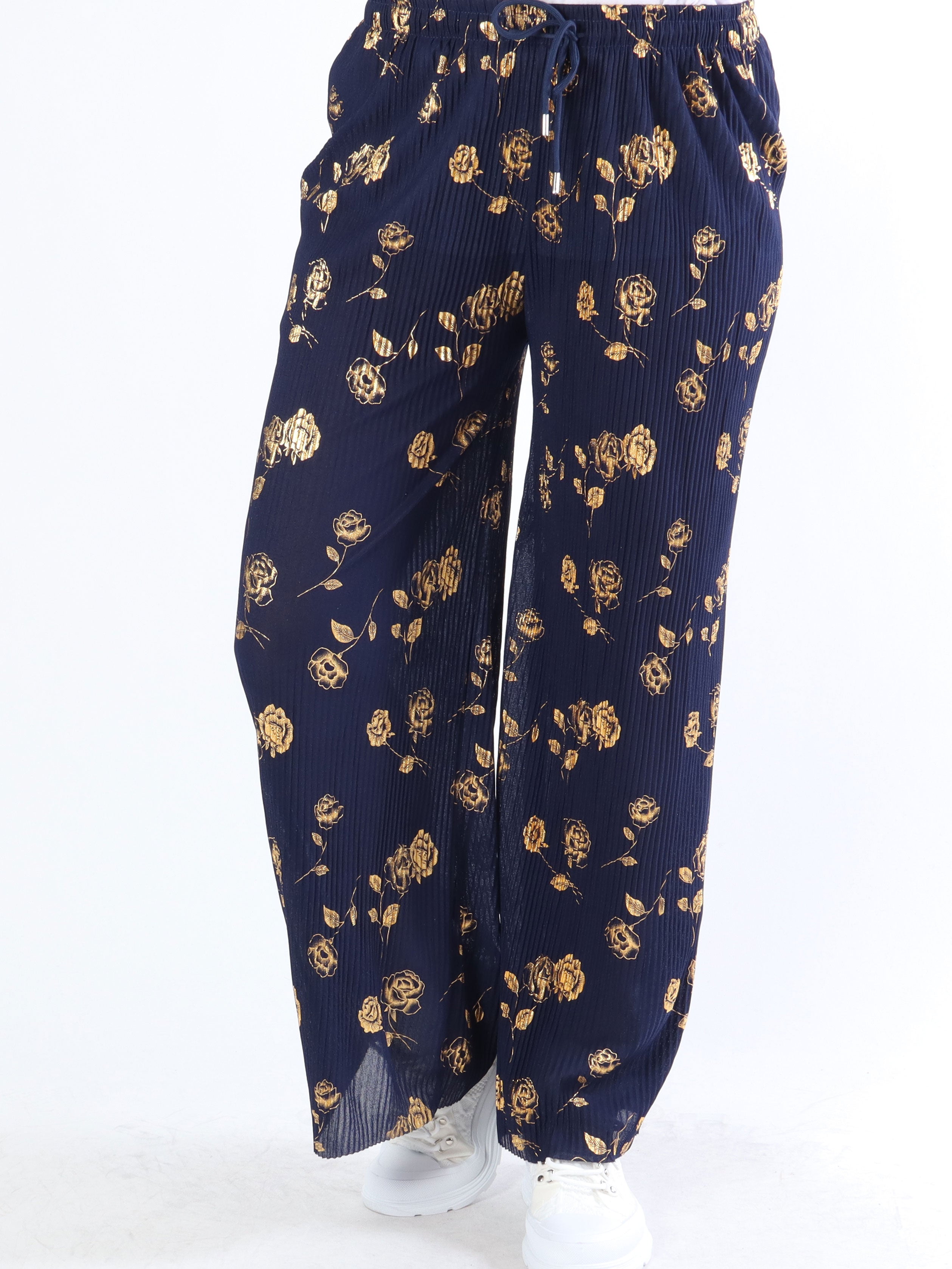 Alpha - Plisserade byxor med guldblommor