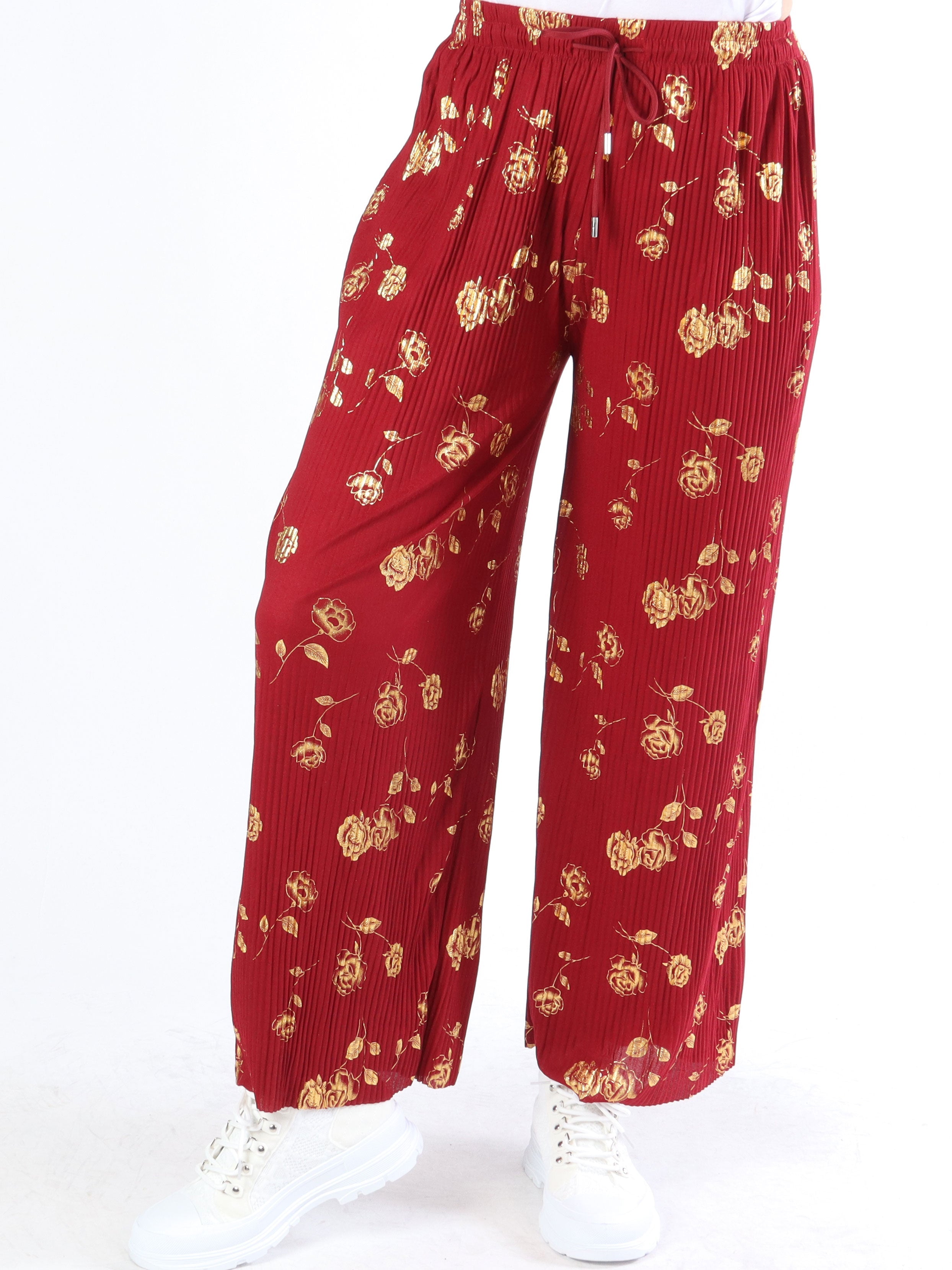 Alpha - Plisserade byxor med guldblommor