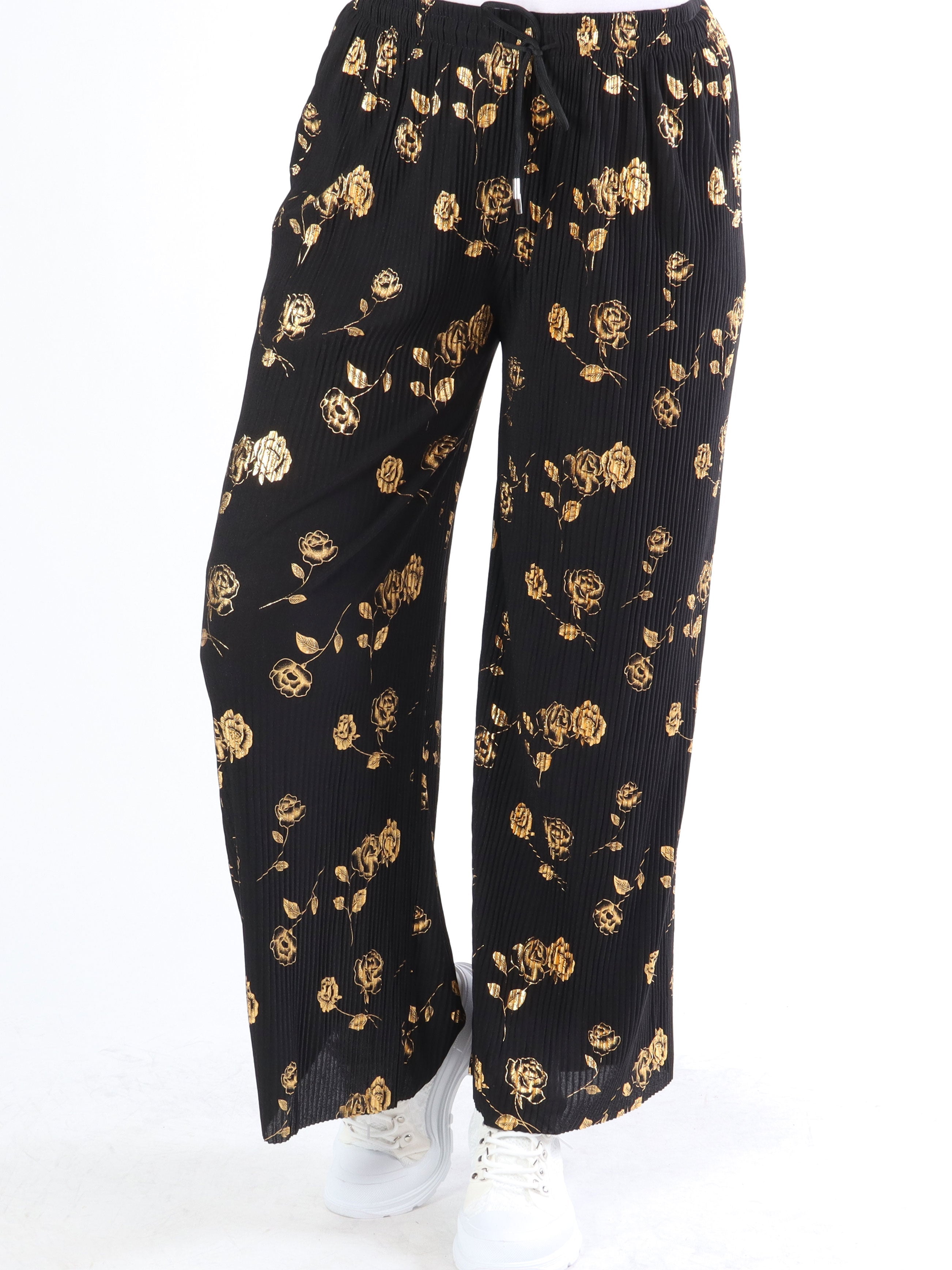 Alpha - Plisserade byxor med guldblommor