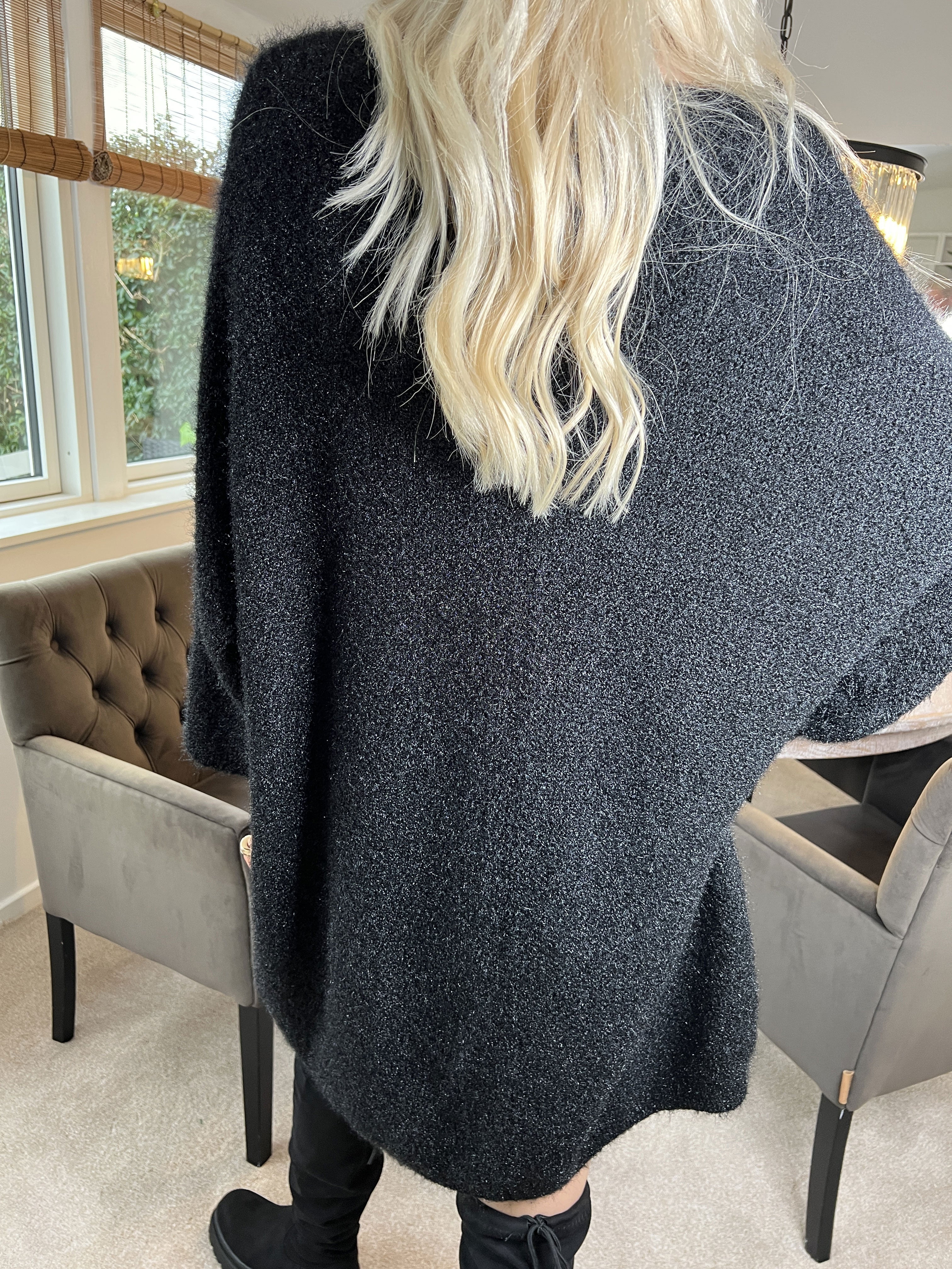 Andria - Mjuk oversize stickad klänning