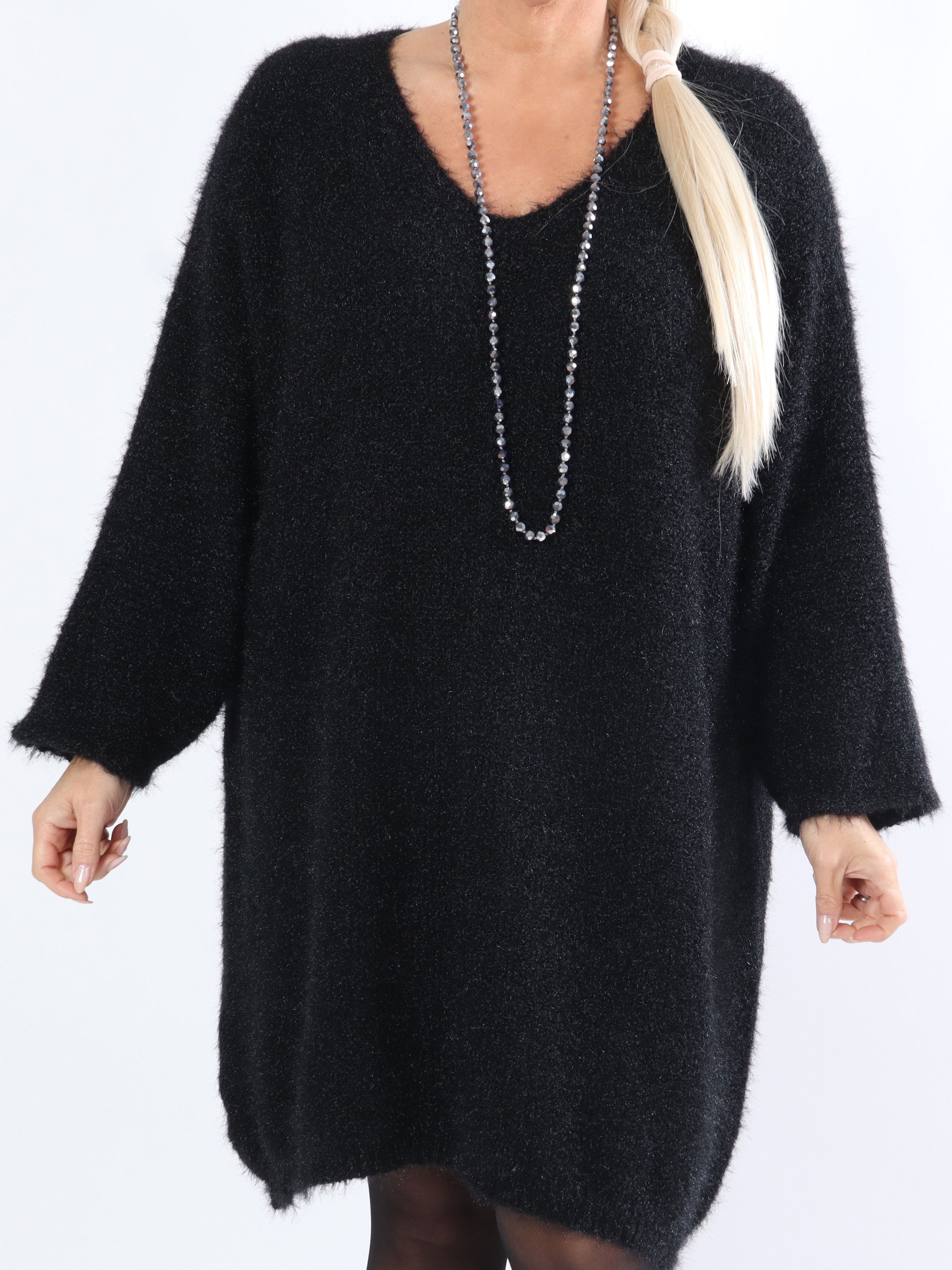 Andria - Mjuk plussize stickad klänning