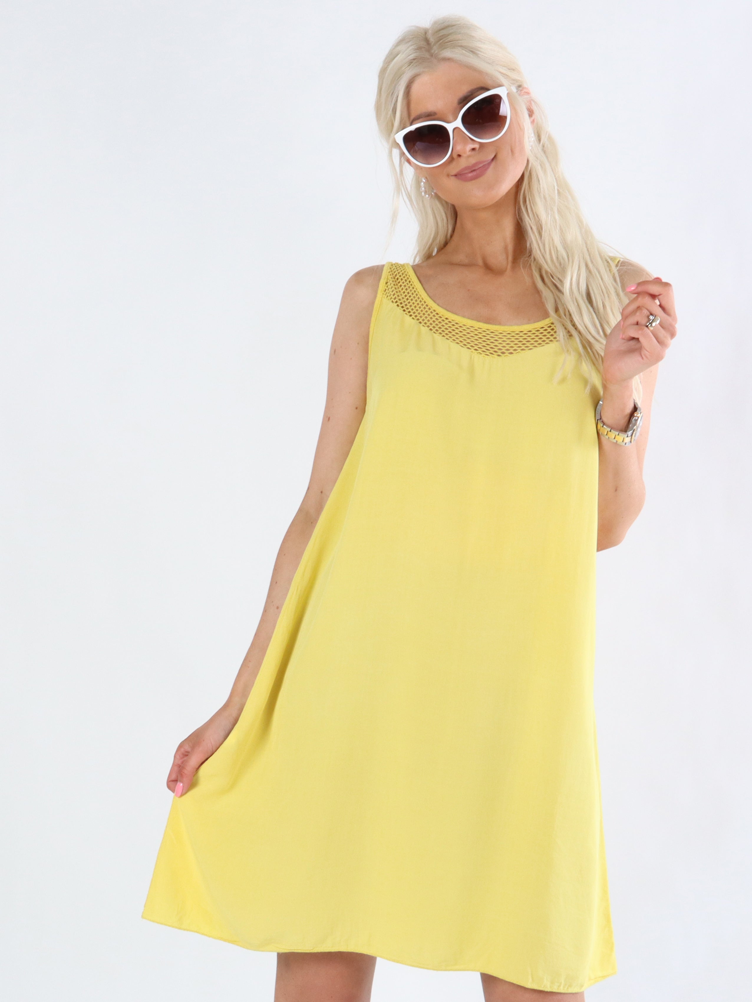 Aprilia - Sommarklänning med nätmönster på axeln