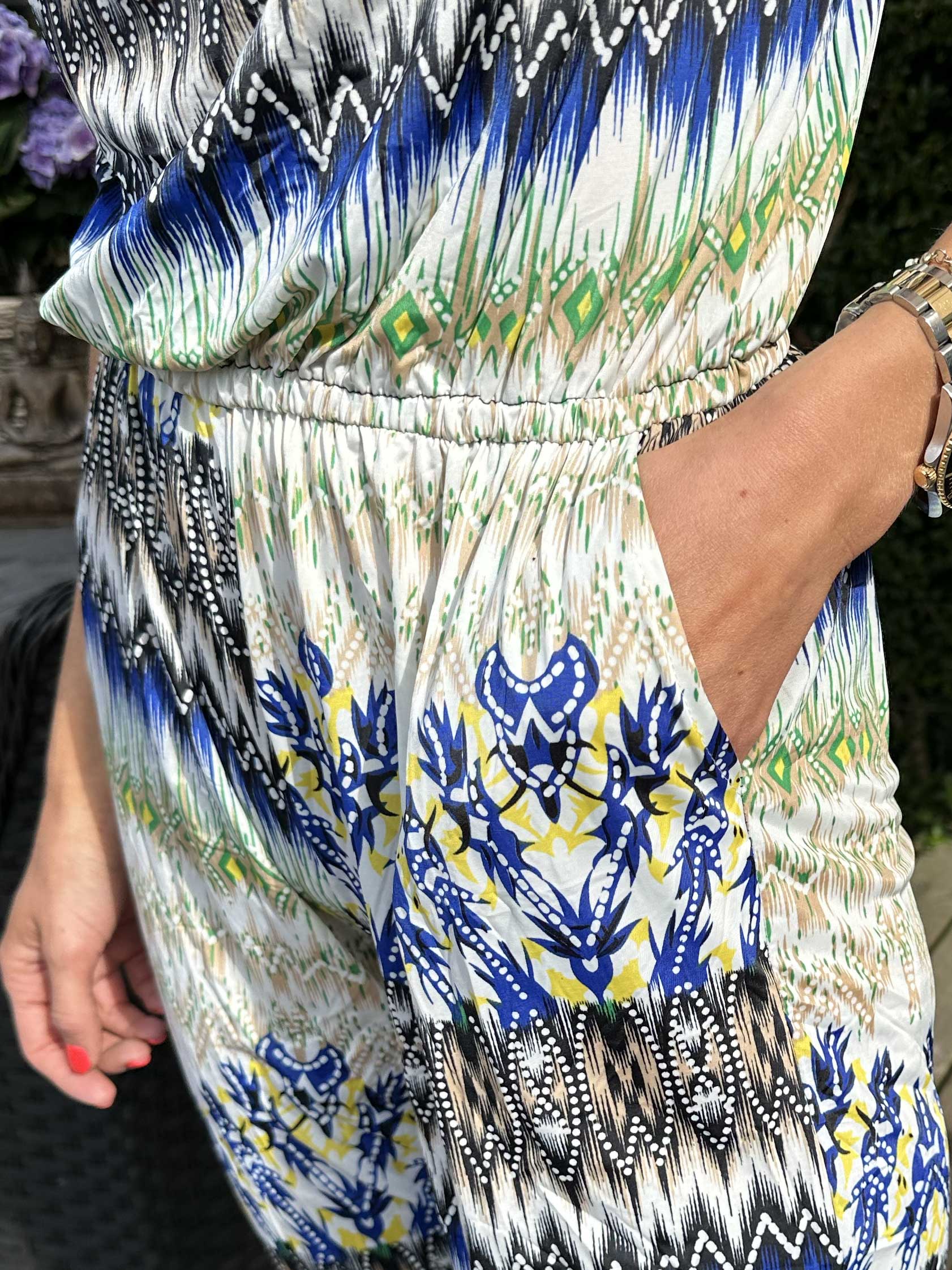 Brooklyn - Mönstrad jumpsuit i elastiskt tyg - Orange