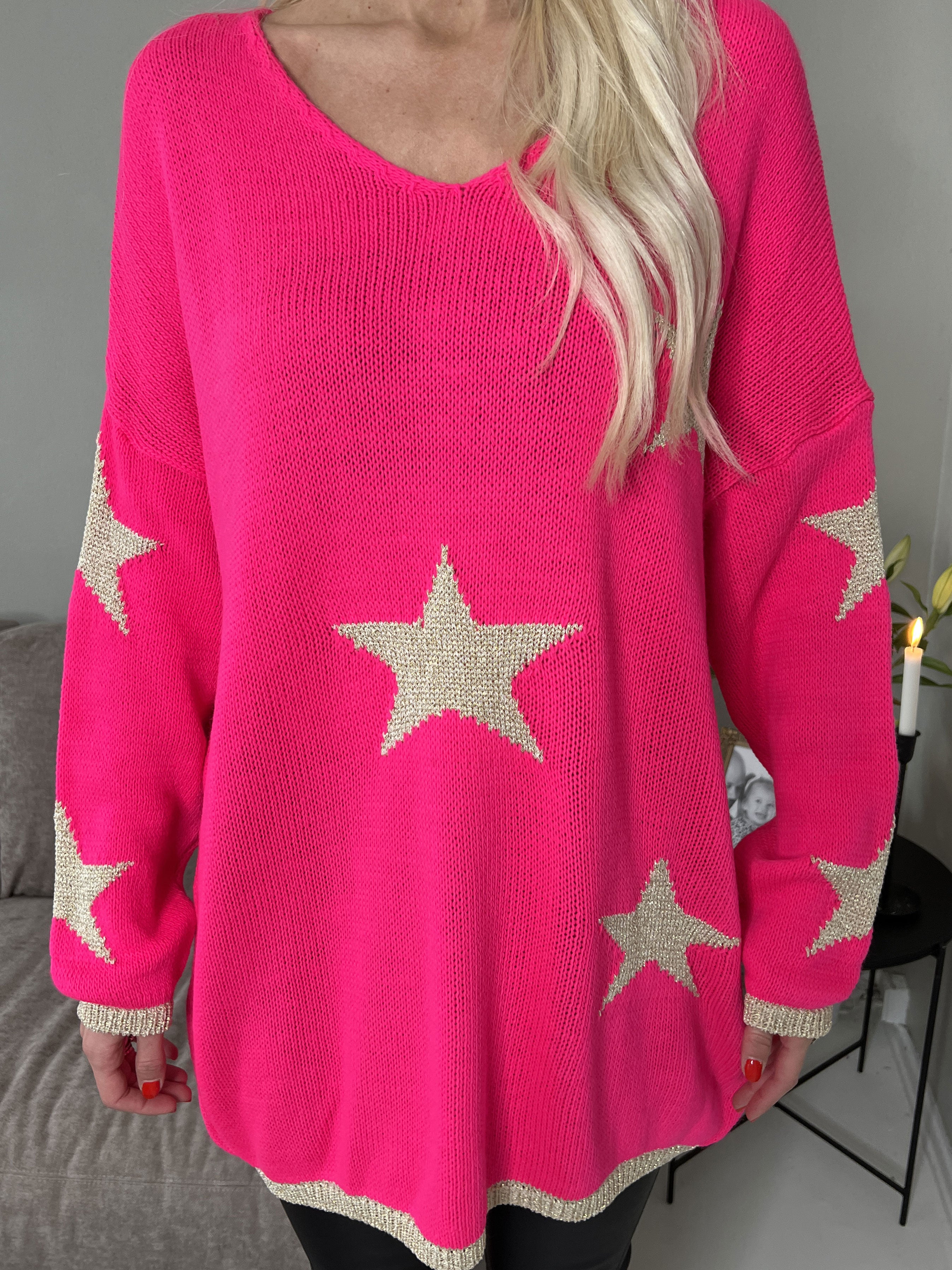 Dina - Stickad med guldstjärnor