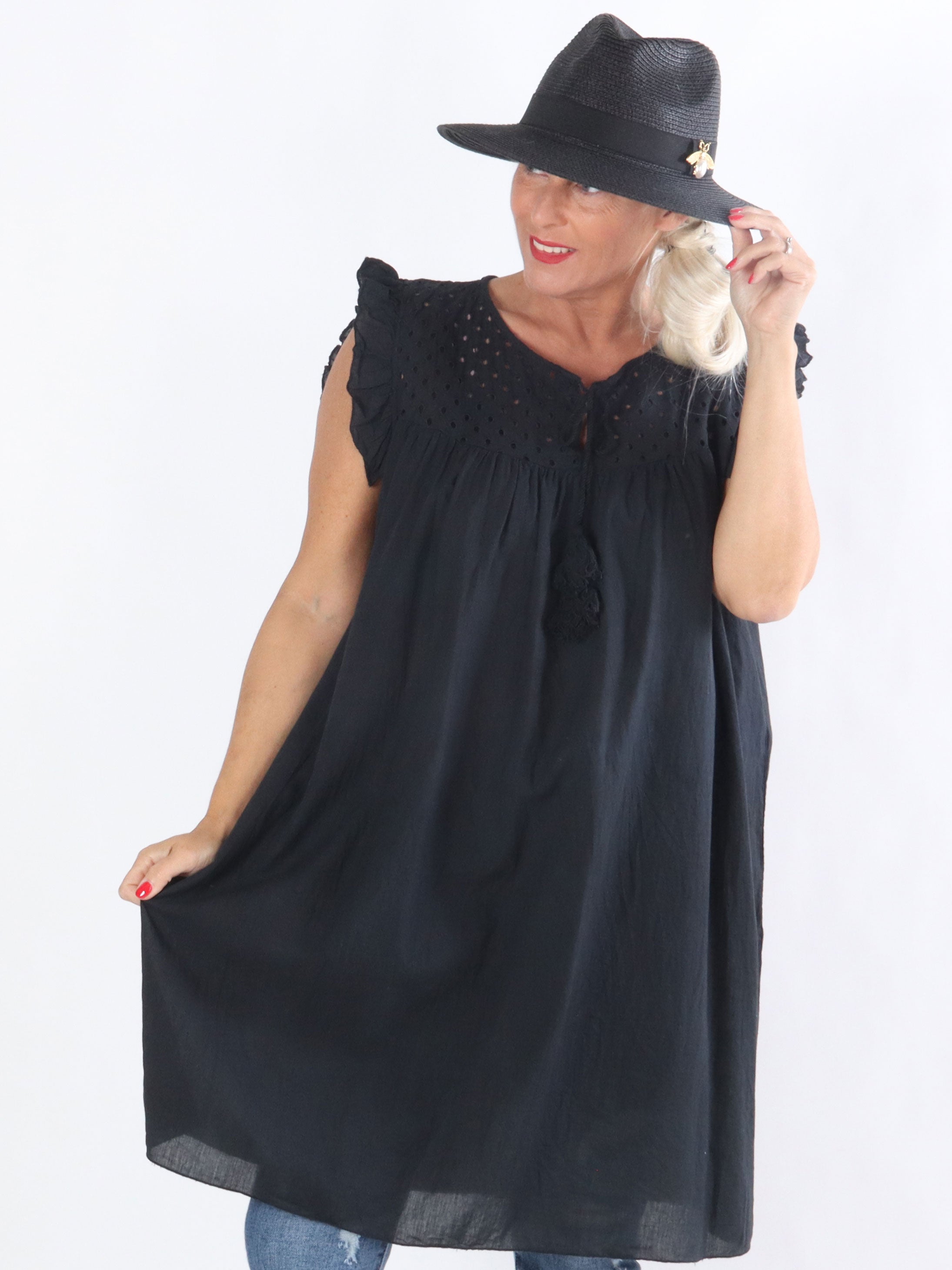 Dora - Tunika med söta detaljer och volangärmar