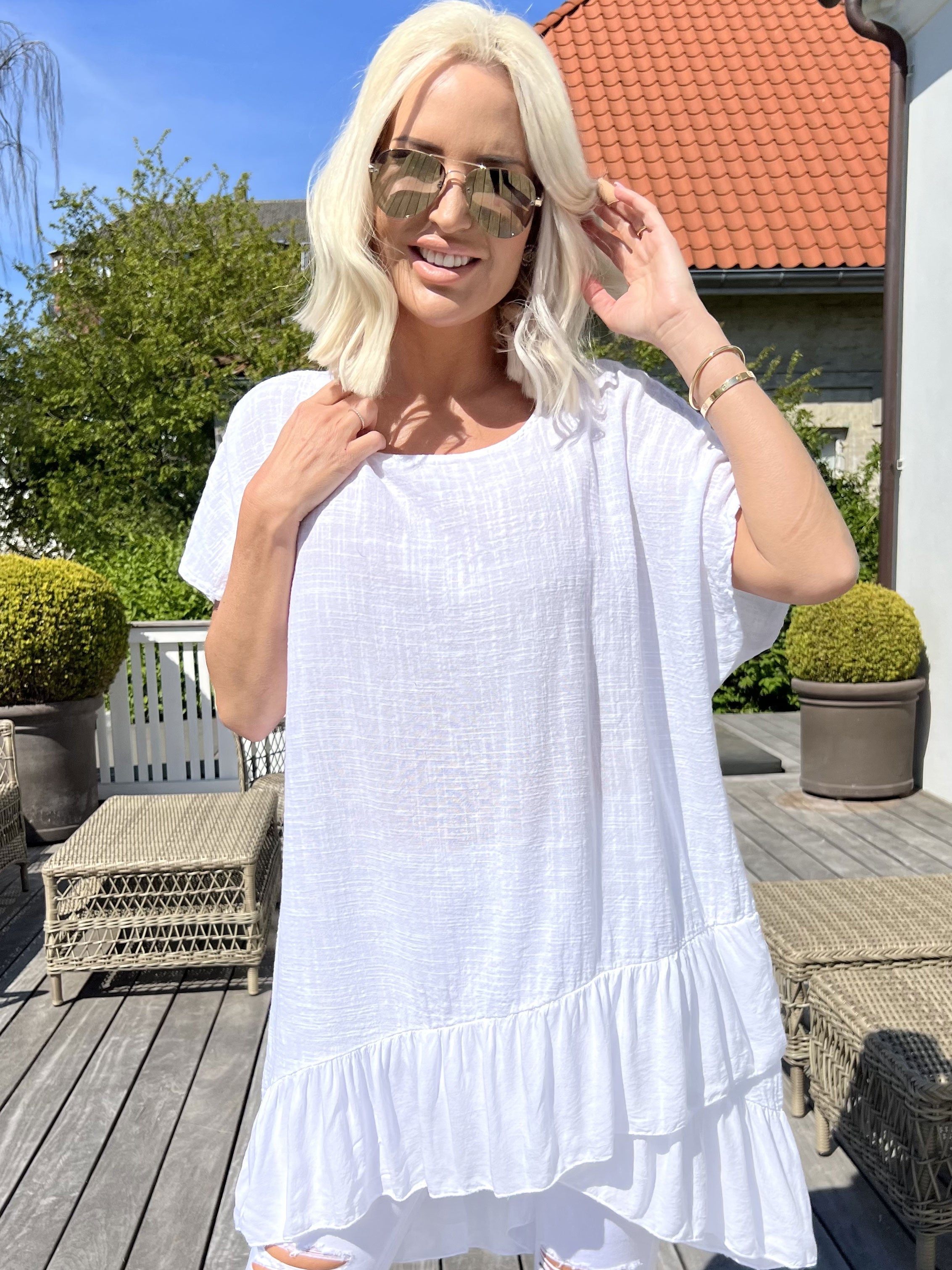 Elba - Tunika med förskjuten längd och volanger