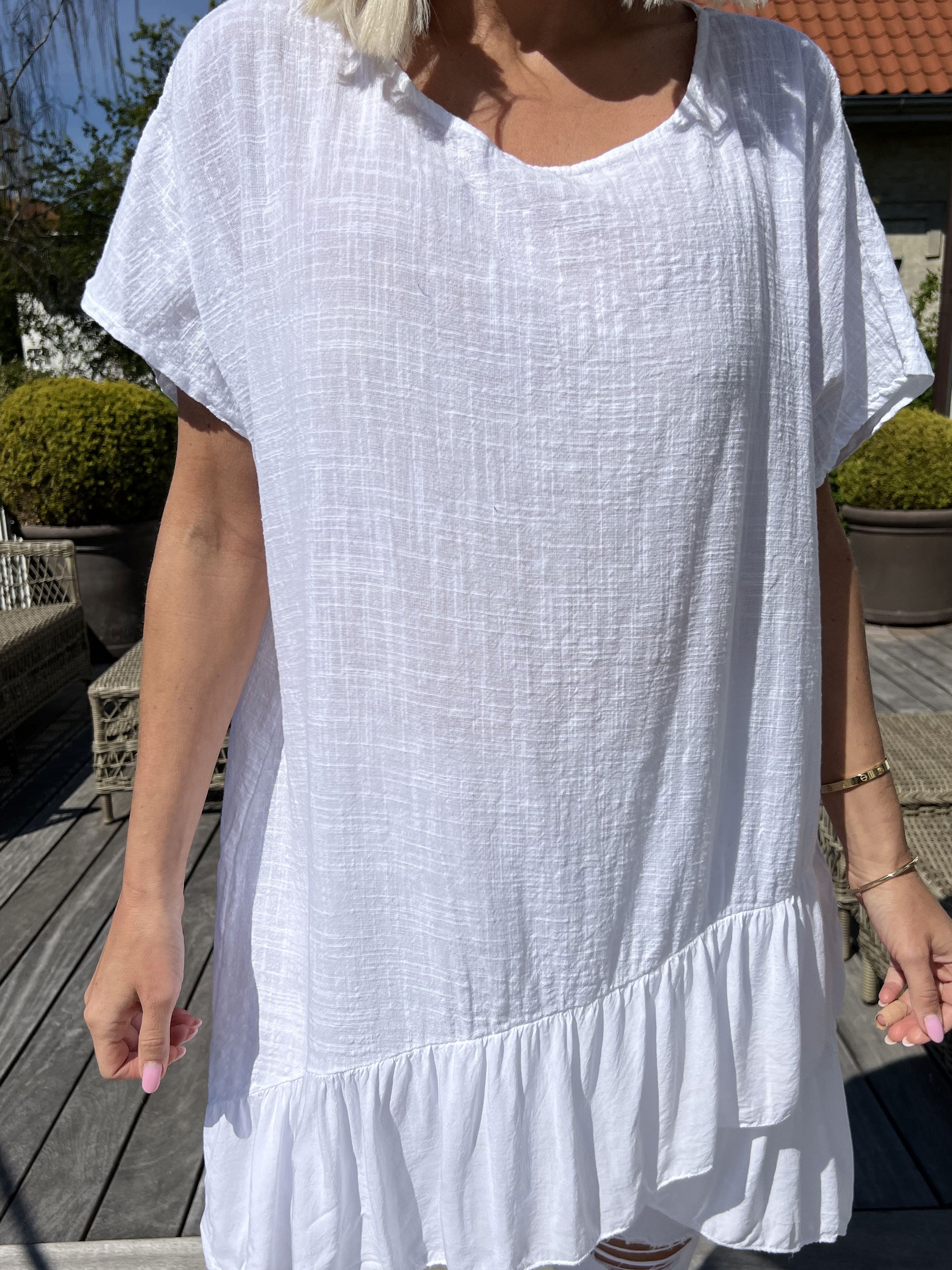 Elba - Tunika med förskjuten längd och volanger