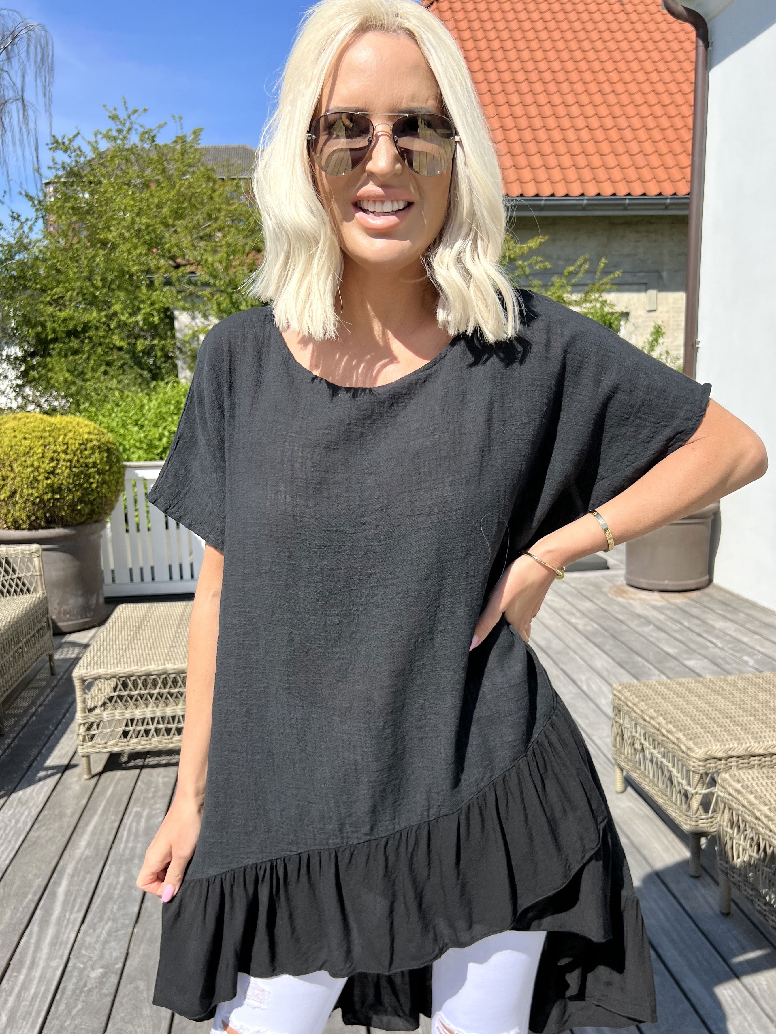 Elba - Tunika med förskjuten längd och volanger