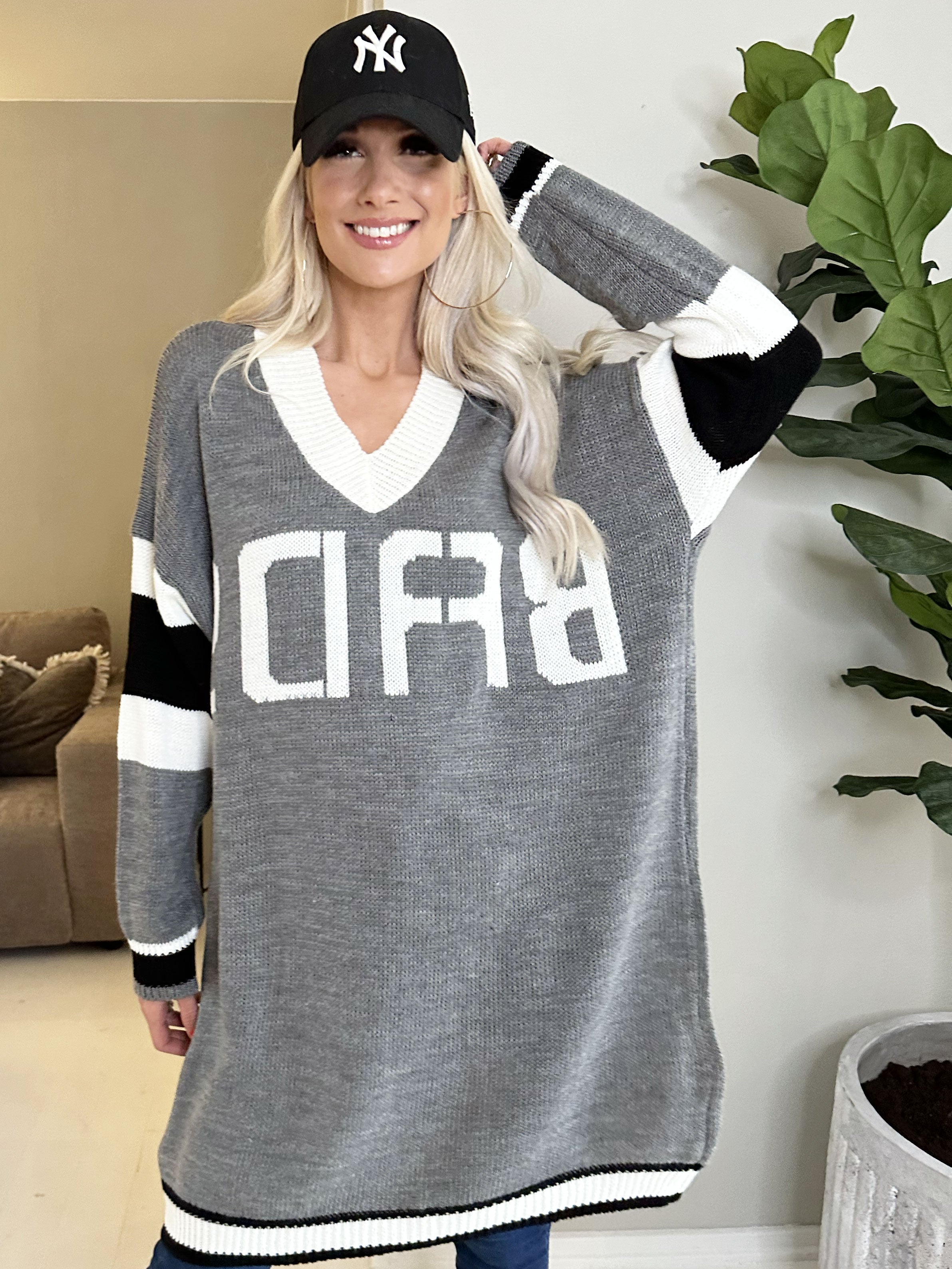 Elvira - Flerfärgad plus size stickad klänning med tryck