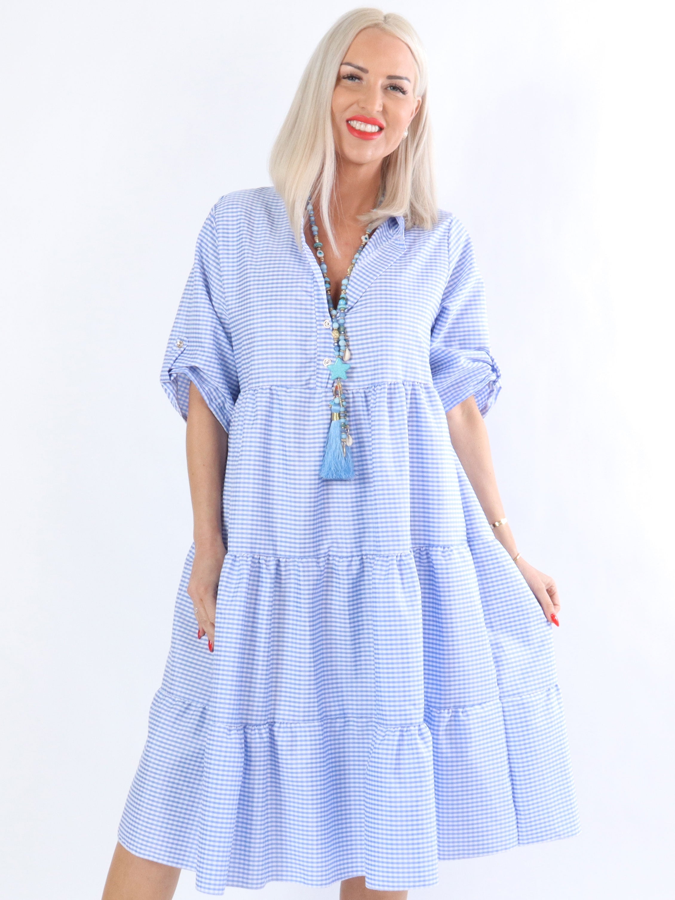 Evelin - Täckt klänning i lagerform