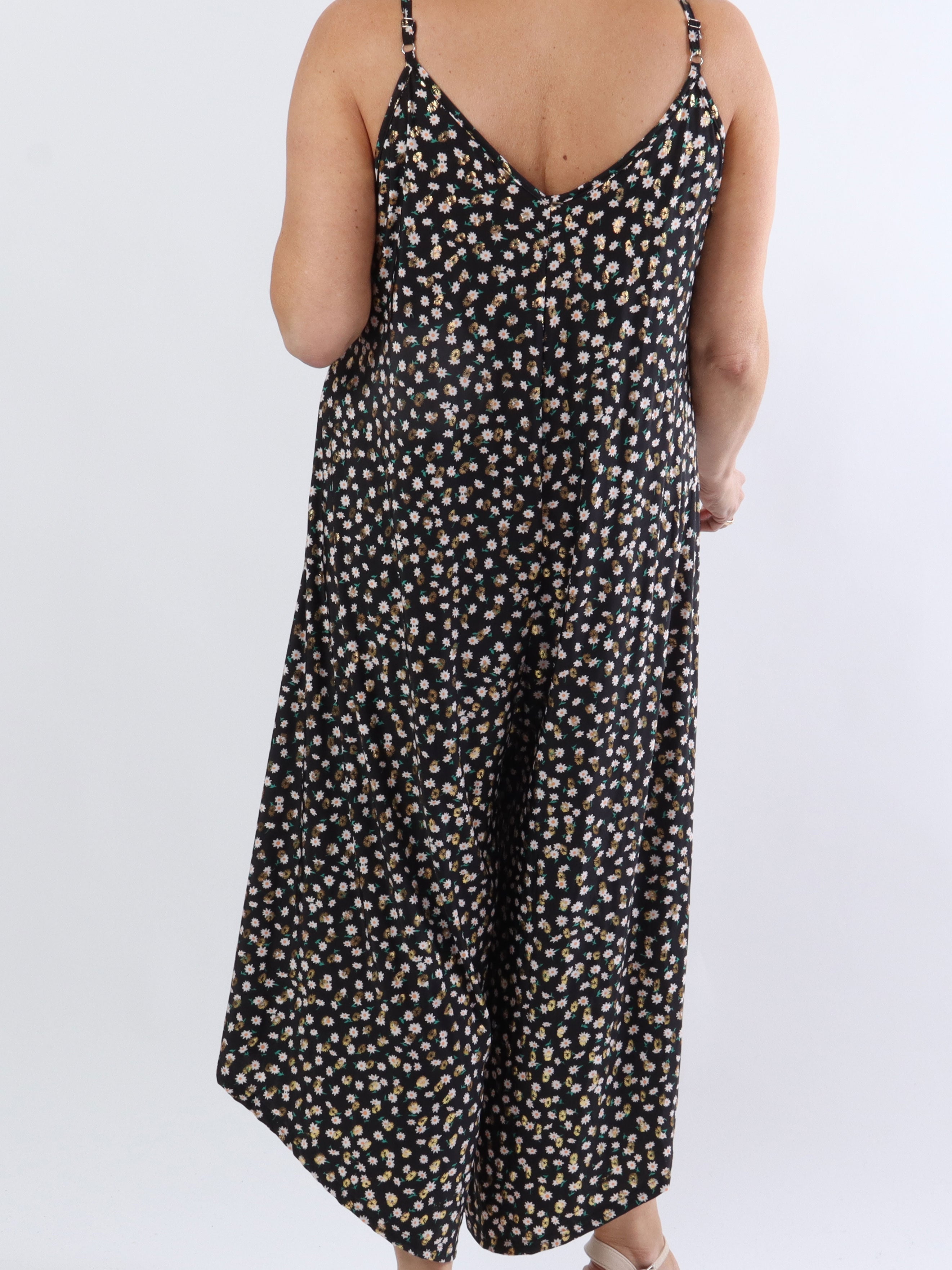 Felicia flower - Plus size byxdräkt med vida ben i stretchigt tyg