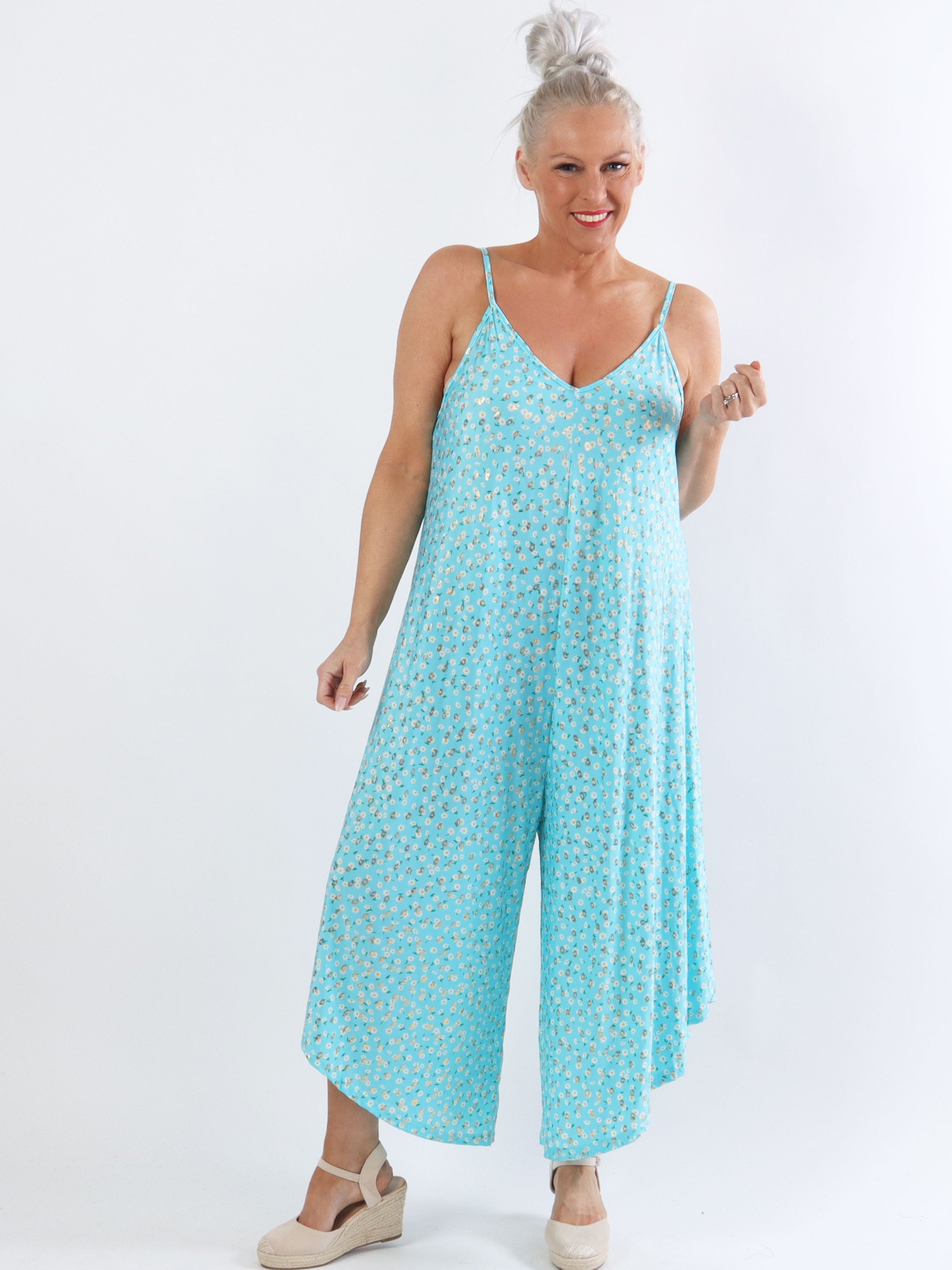 Felicia flower - Plus size byxdräkt med vida ben i stretchigt tyg