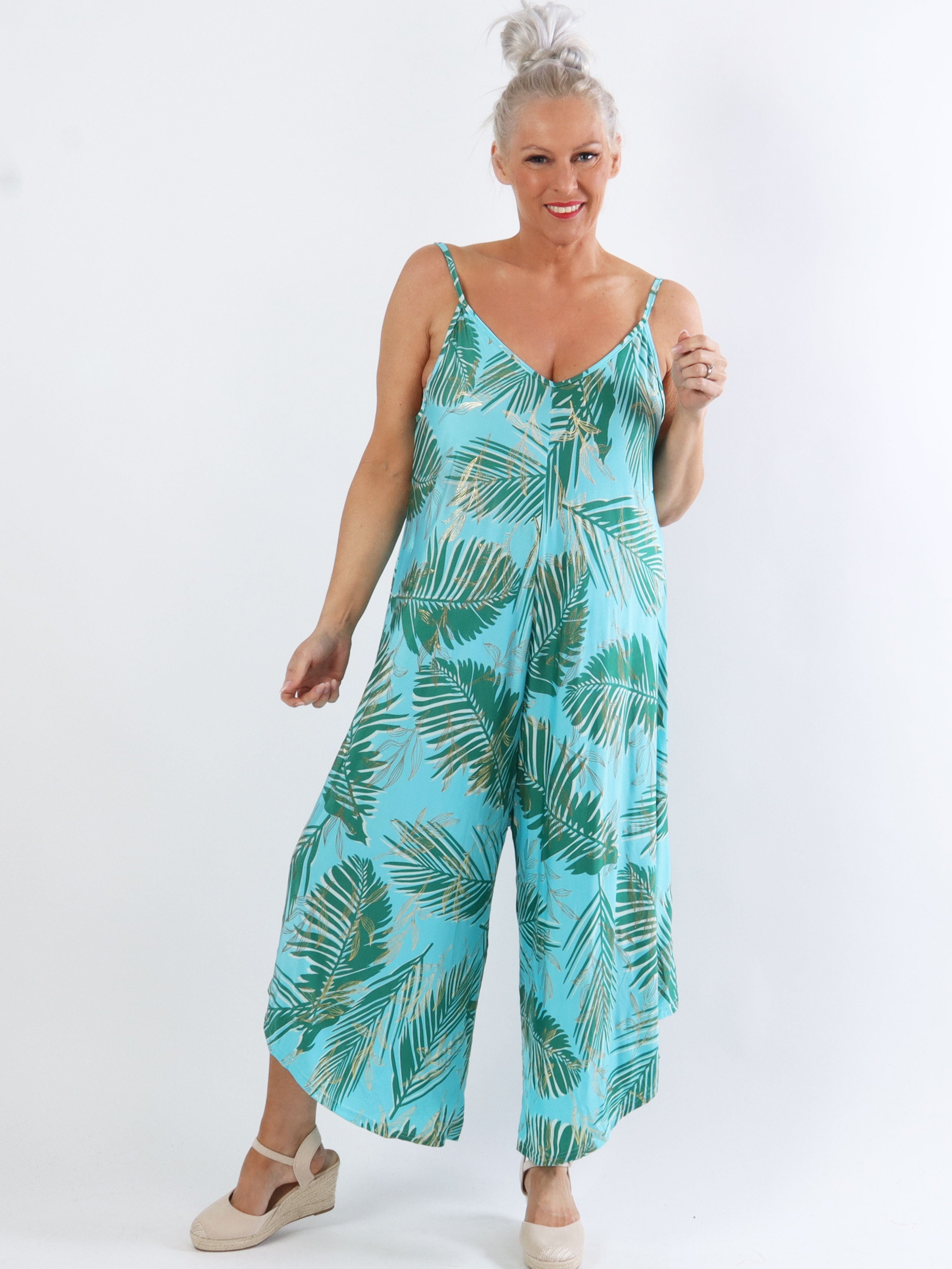 Felicia palm - Plus size byxdräkt med vida ben i stretchigt tyg