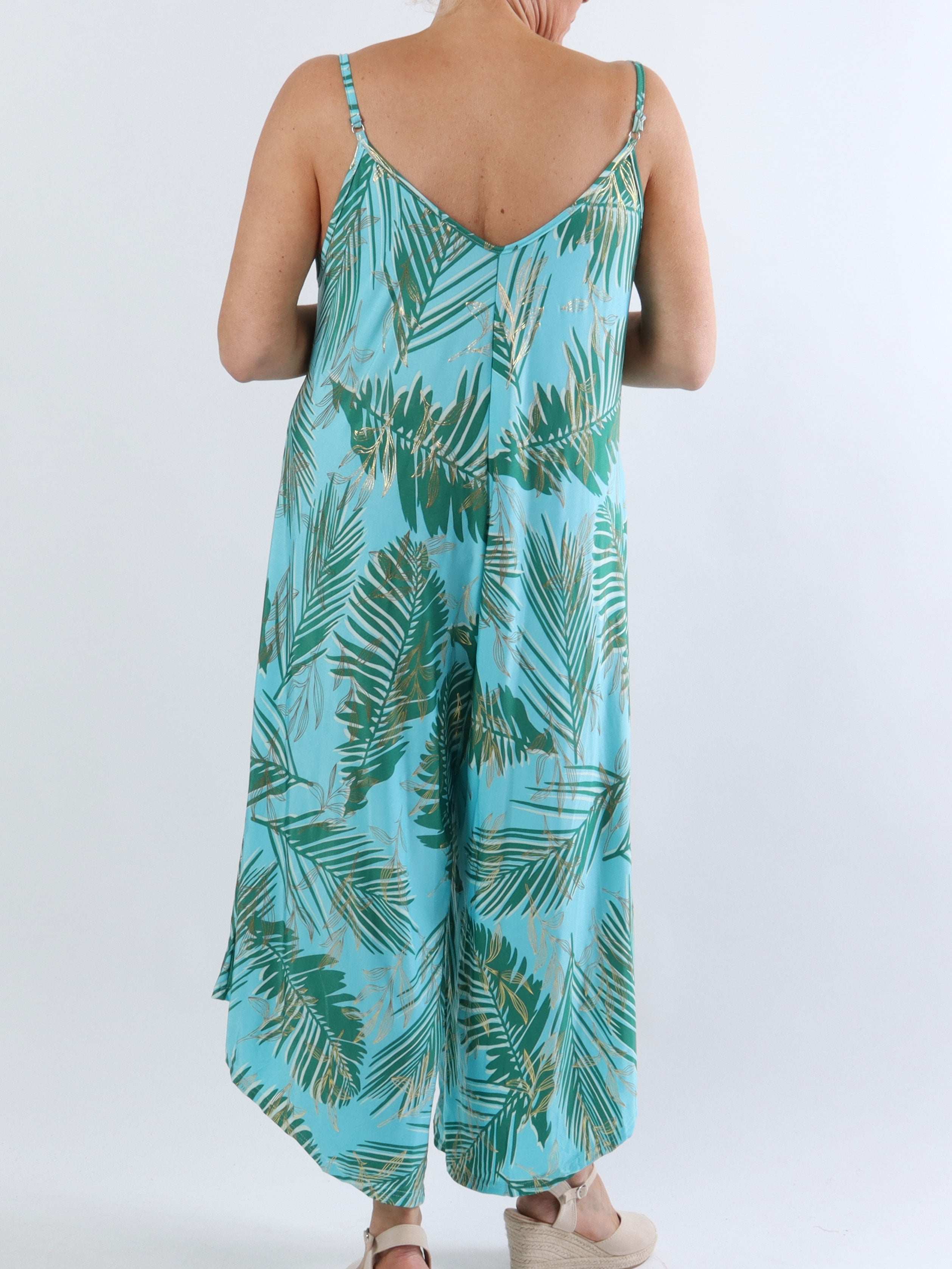 Felicia palm - Plus size byxdräkt med vida ben i stretchigt tyg