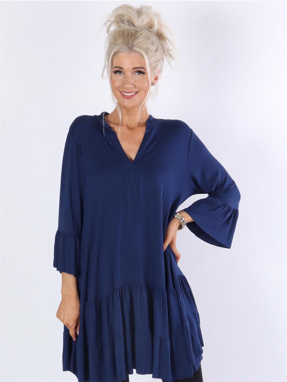 Pauline - Klänning med v-ringning och liten volangkjol