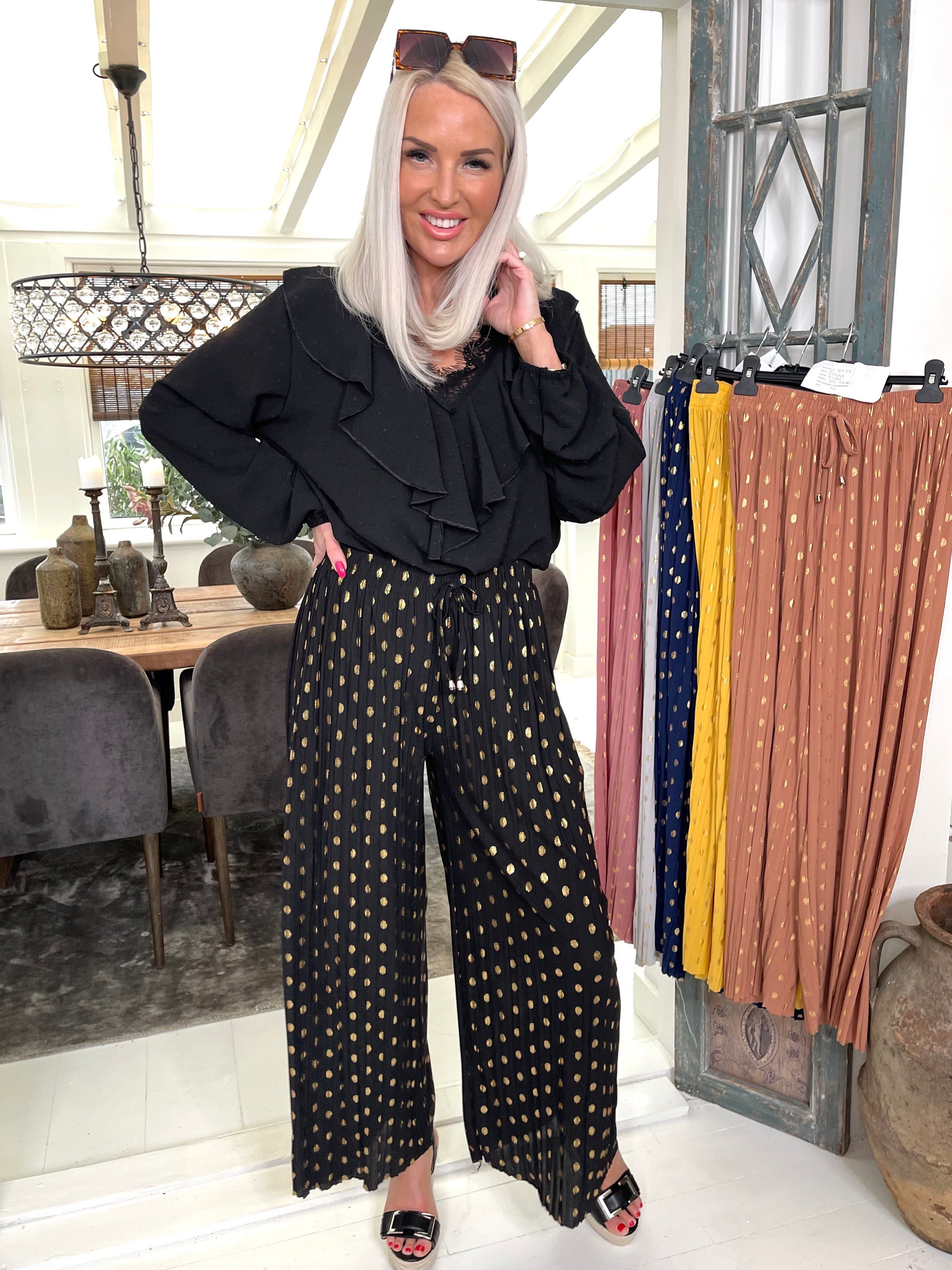 Fahima - Byxor med gulddetaljer och veck