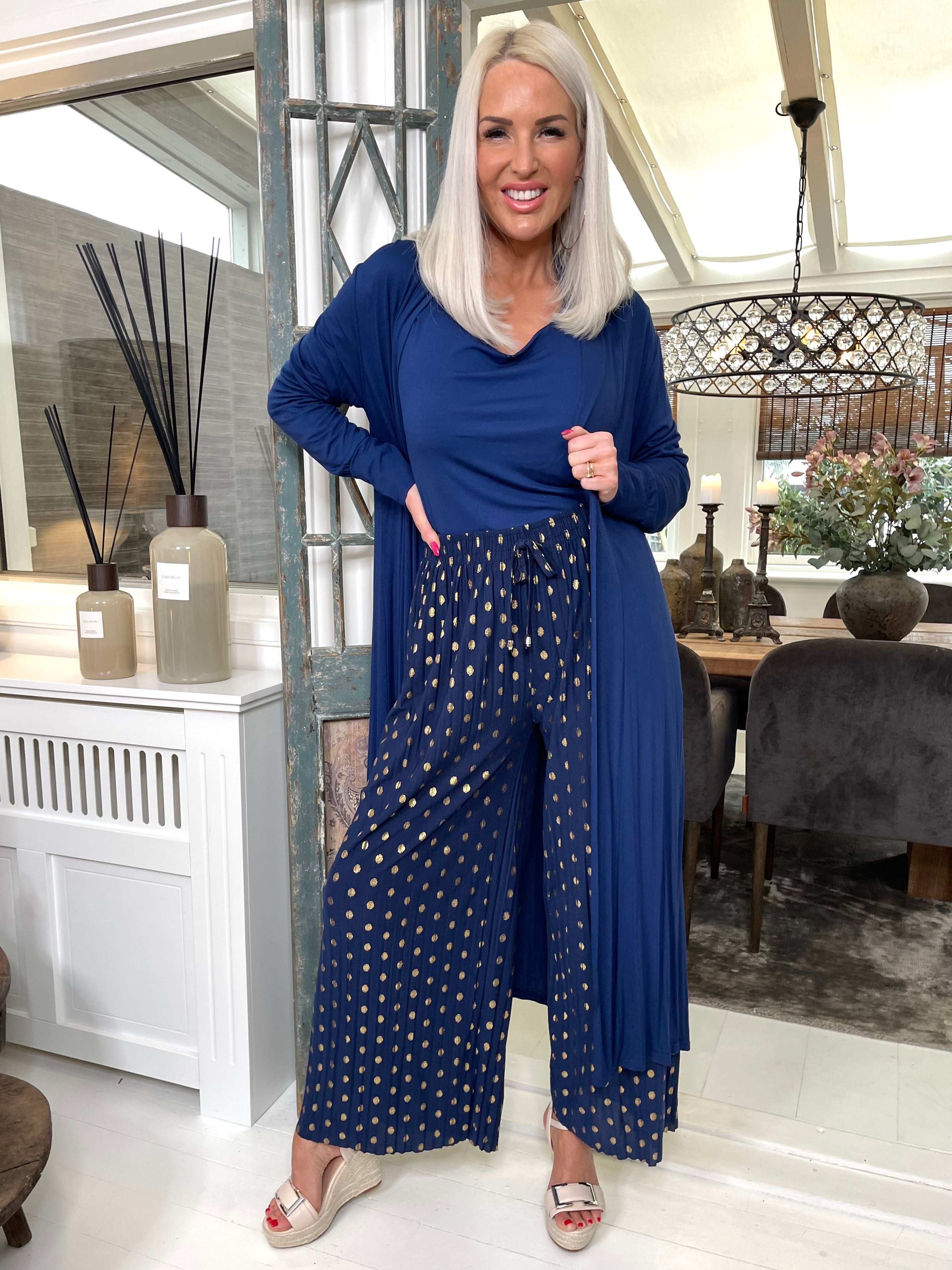 Fahima - Byxor med gulddetaljer och veck