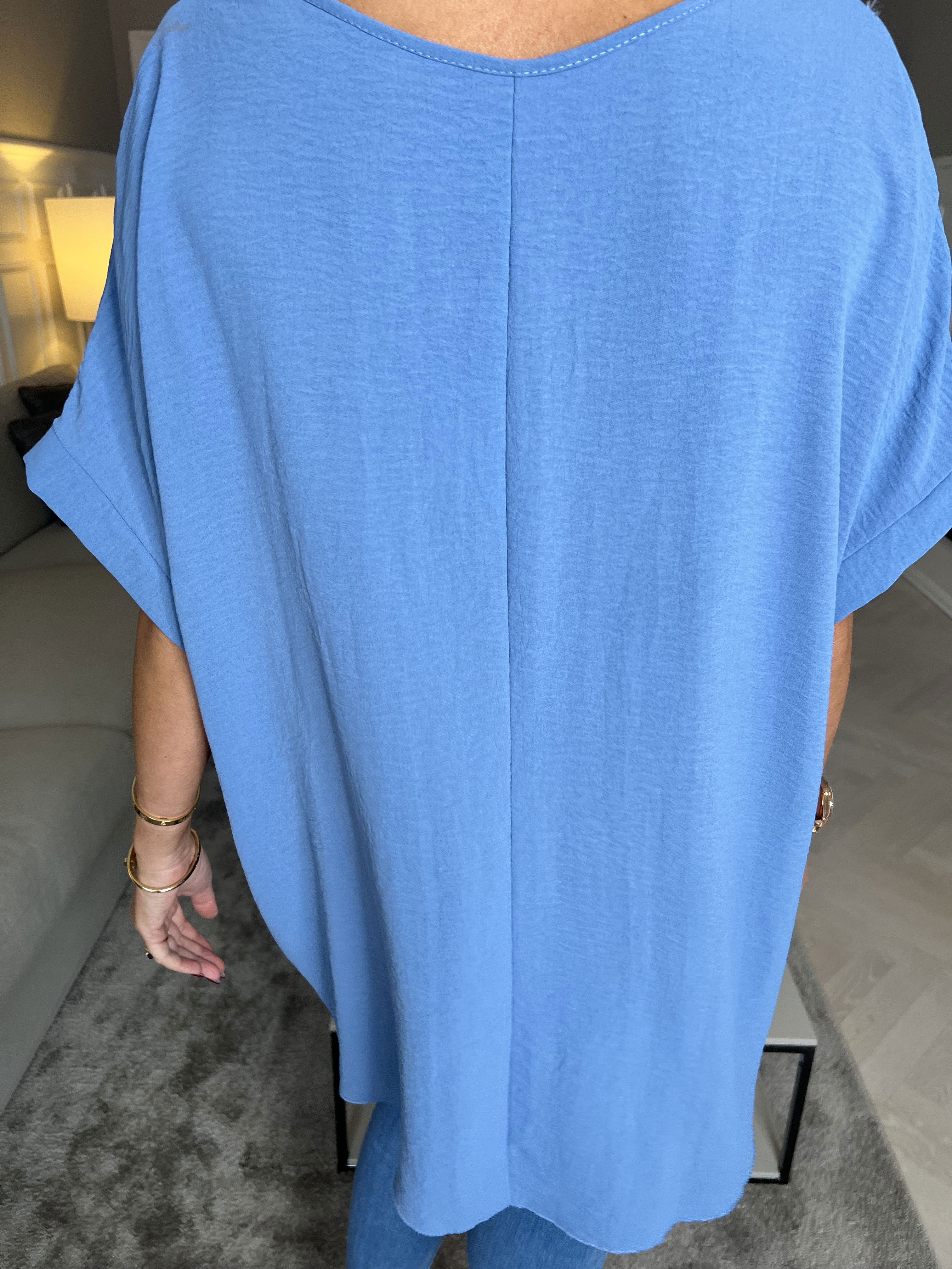 Lilly - Vacker tunika med unik halsringning