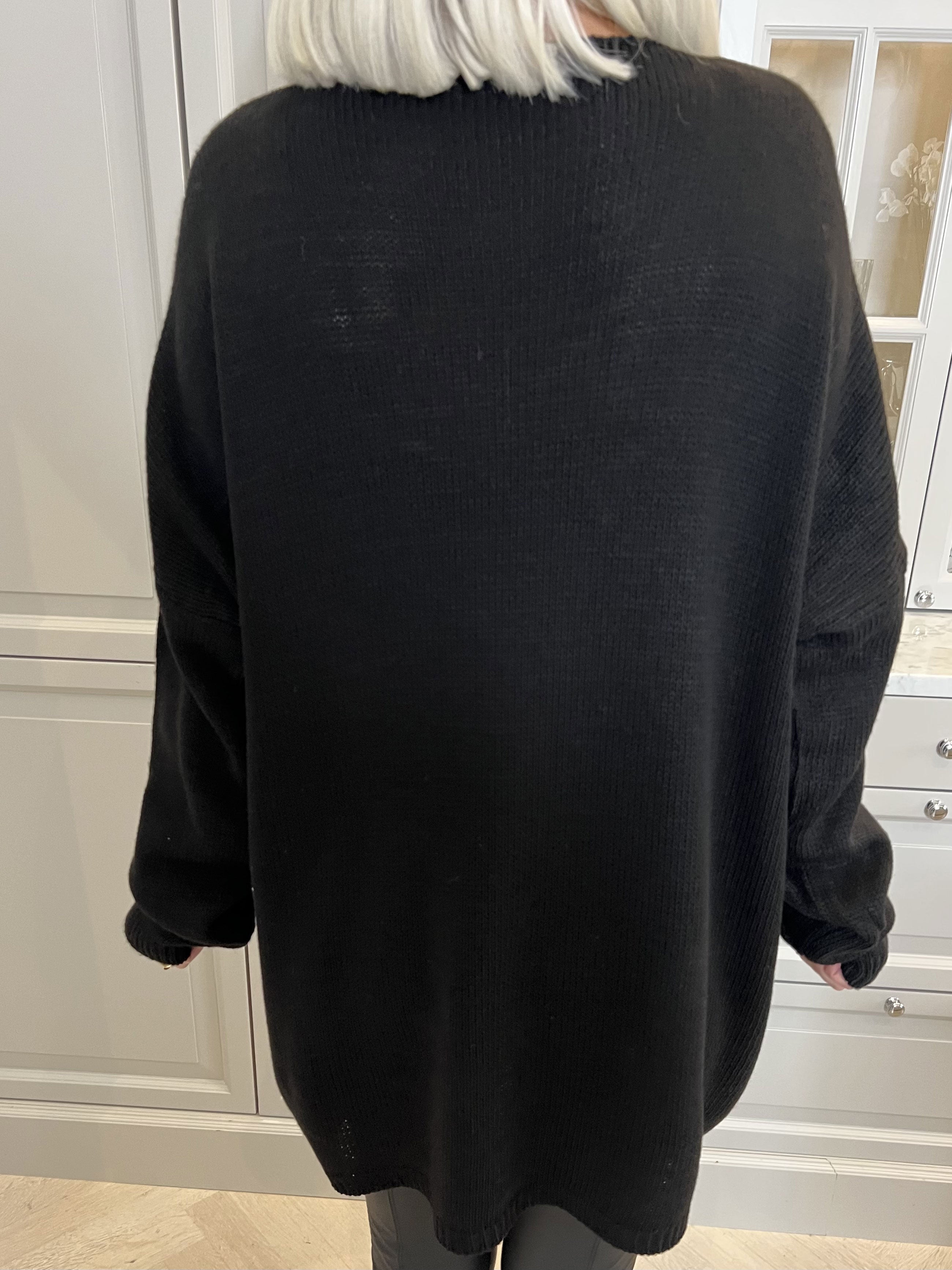 Camille - Söt stickning med v-ringning och stjärnor