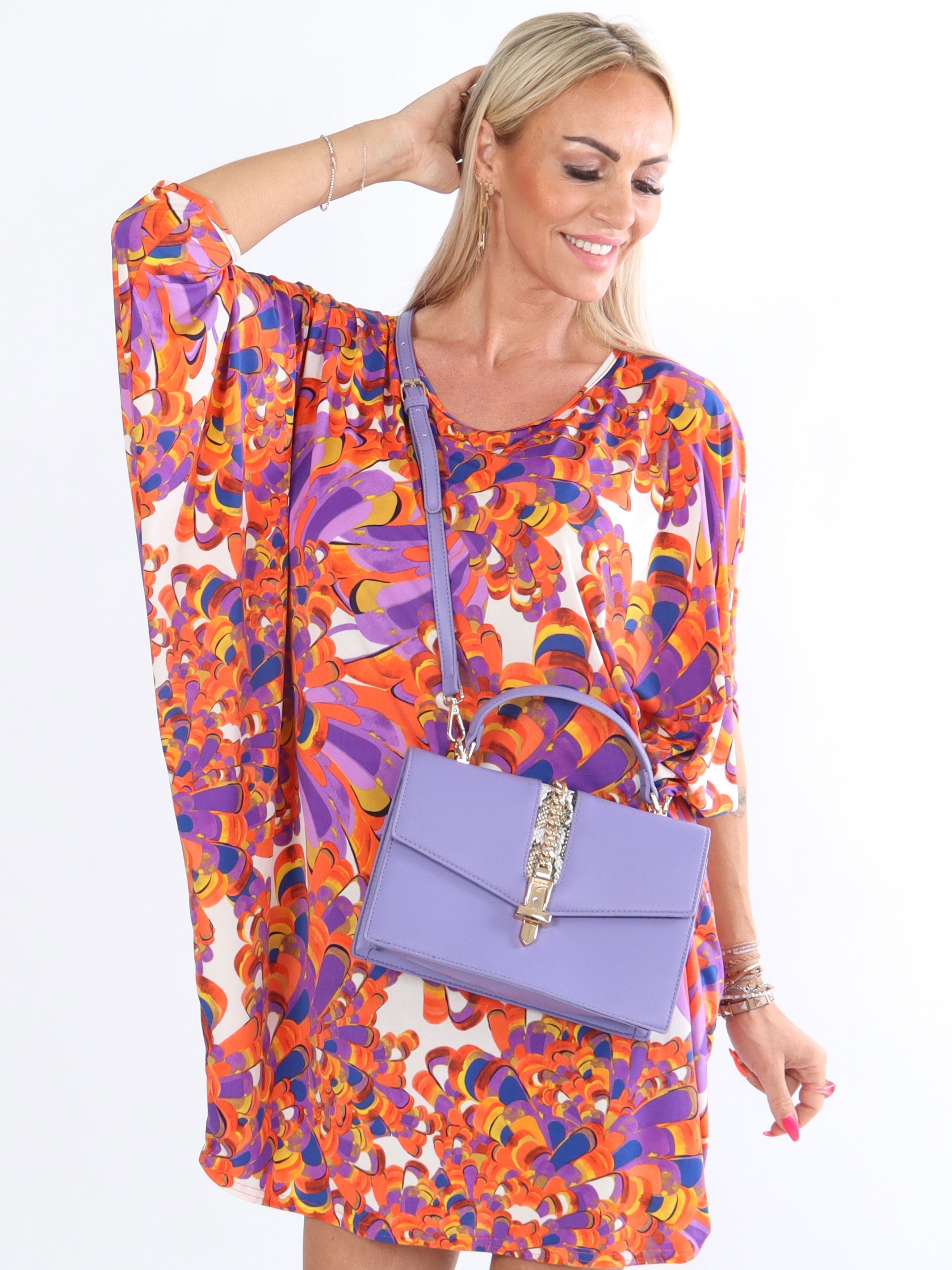 Rimini - Elastisk klänning med fladdermusärmar